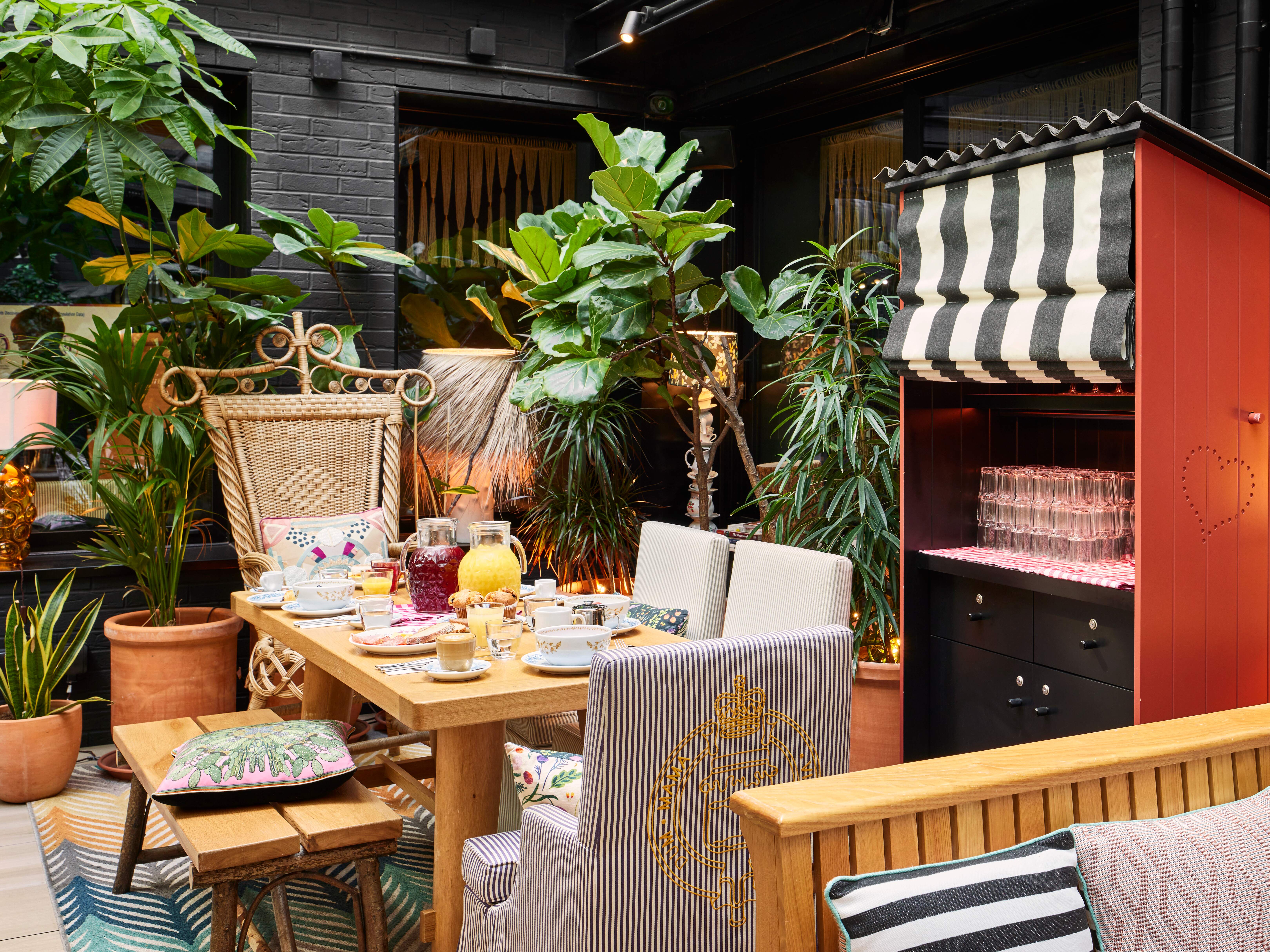 Outdoor meeting space at Mama Shelter London with stylish decor for networking events.