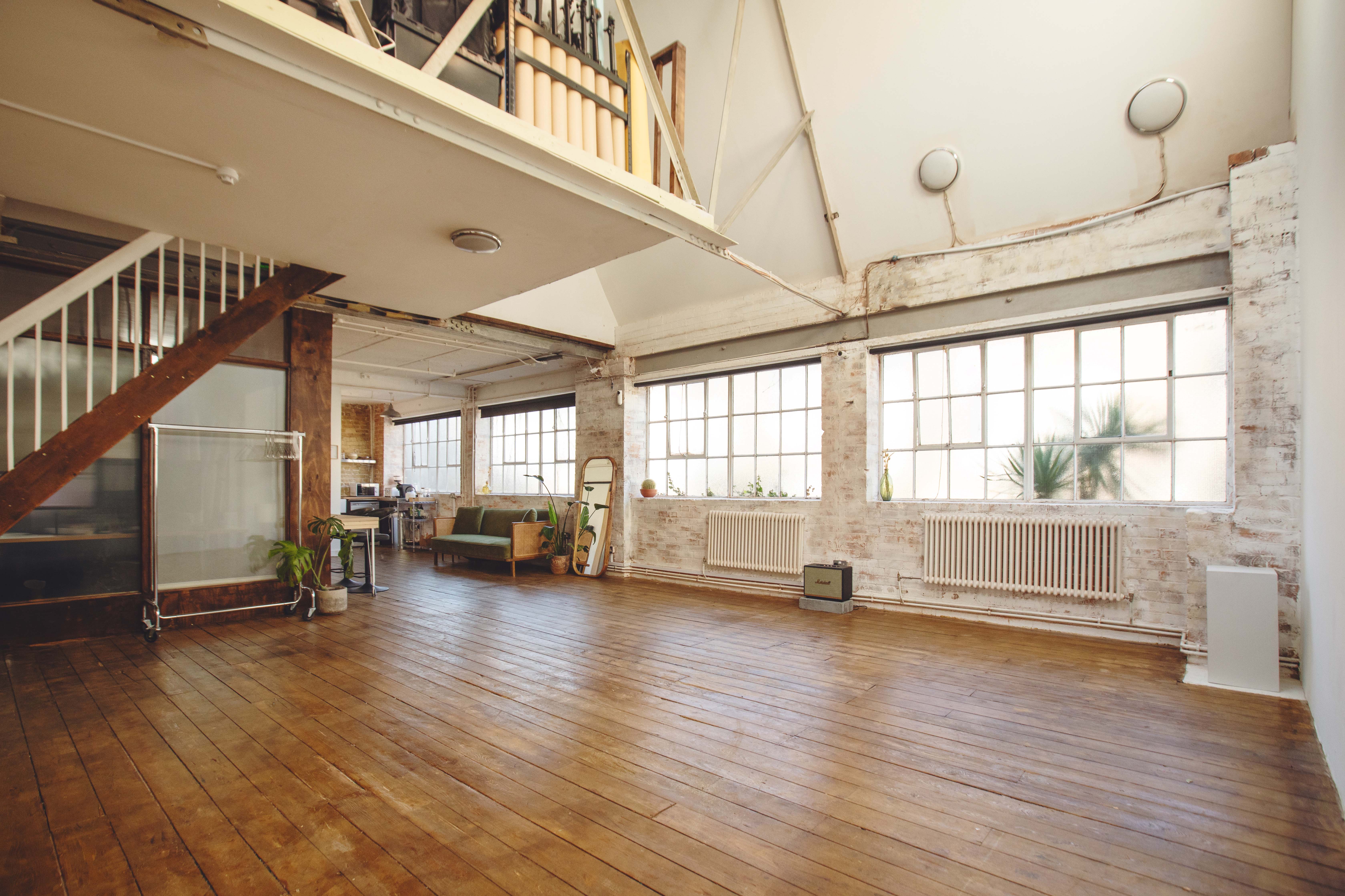 Industrial-chic event venue with high ceilings for creative workshops and pop-up events.