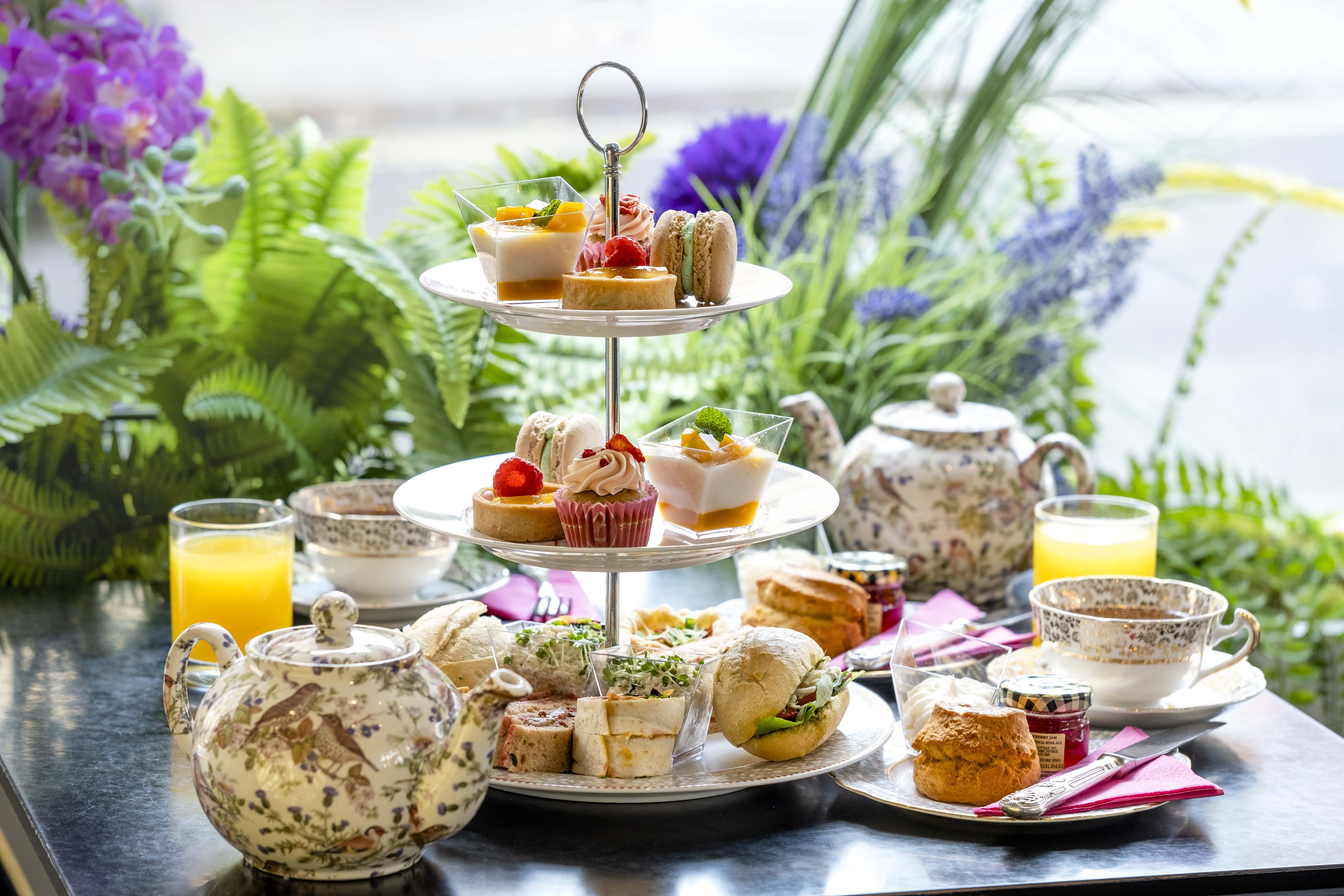 Brigit's Bakery afternoon tea on London bus for luxury networking and corporate events.