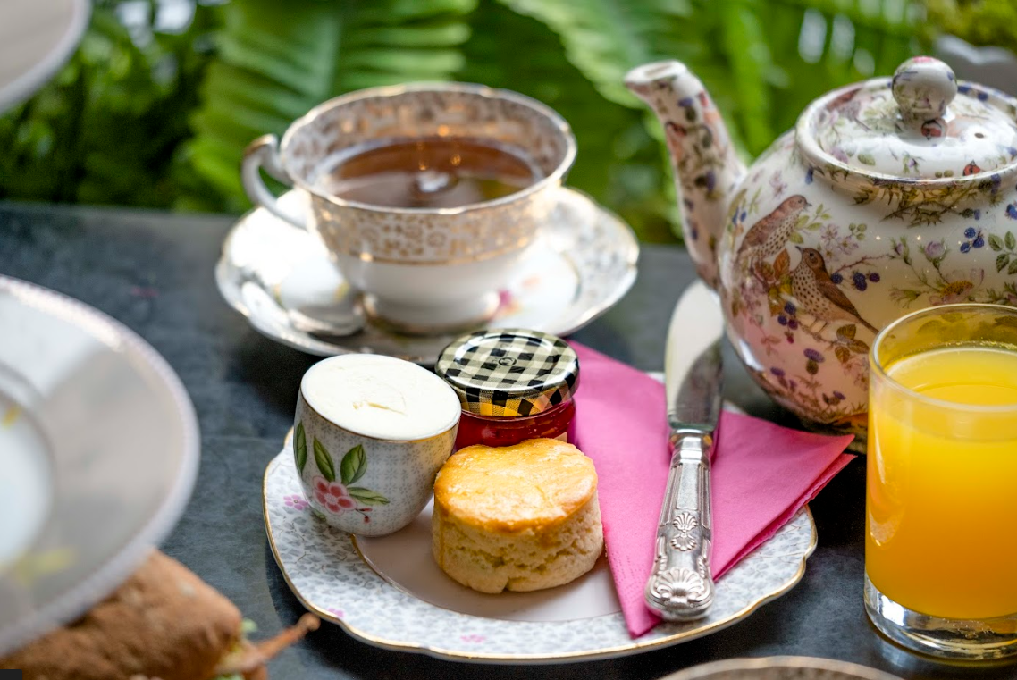Brigit’s Bakery bus afternoon tea: elegant table setup for VIP networking or private events.
