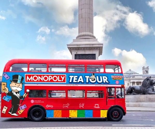 Brigit’s Afternoon Tea branded London double-decker bus for corporate events and group travel.