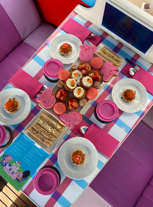 Peppa Pig themed afternoon tea party bus in London for branded kids birthday events.