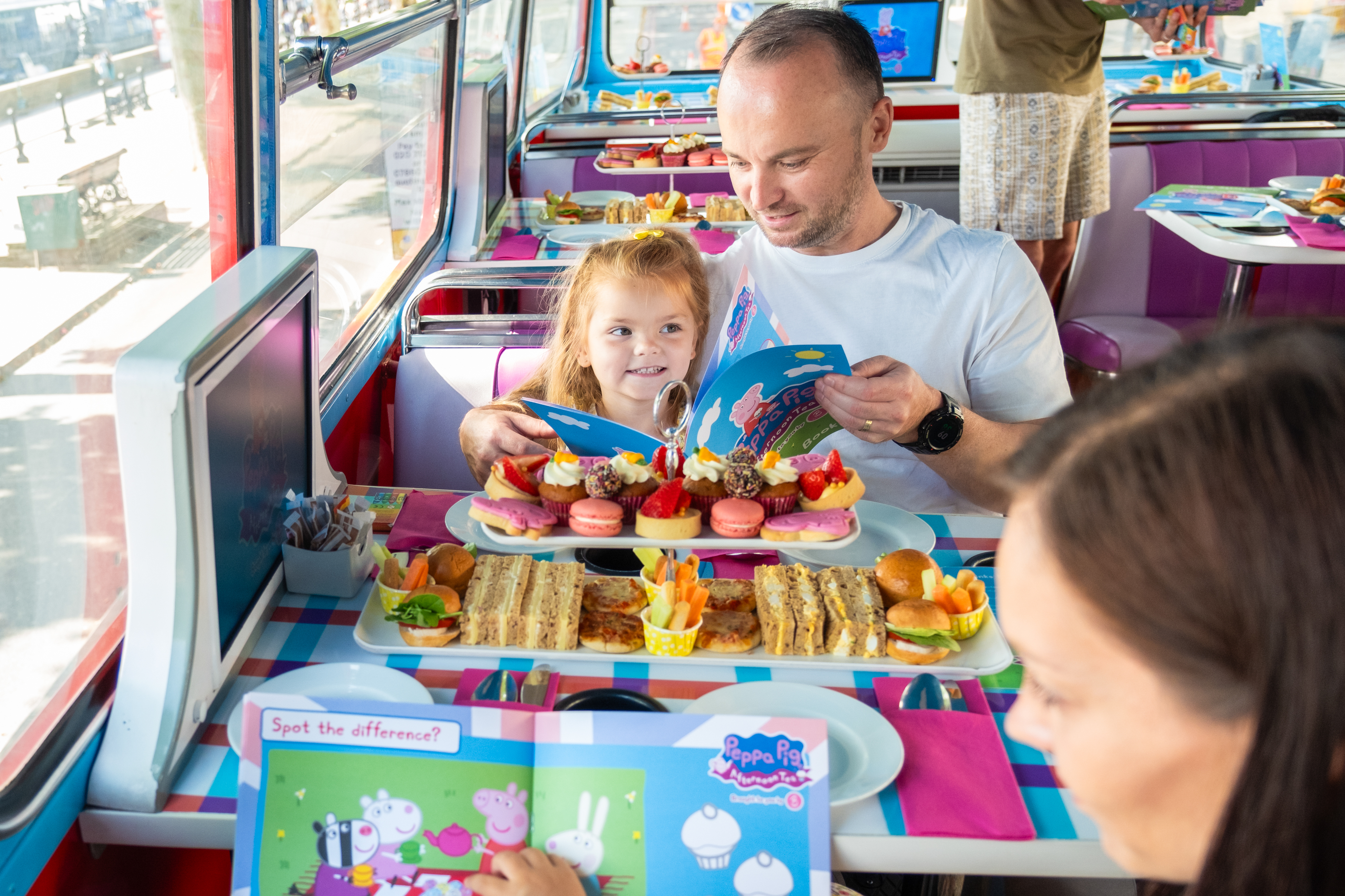 Peppa Pig branded double-decker bus for immersive afternoon tea party hire in London.
