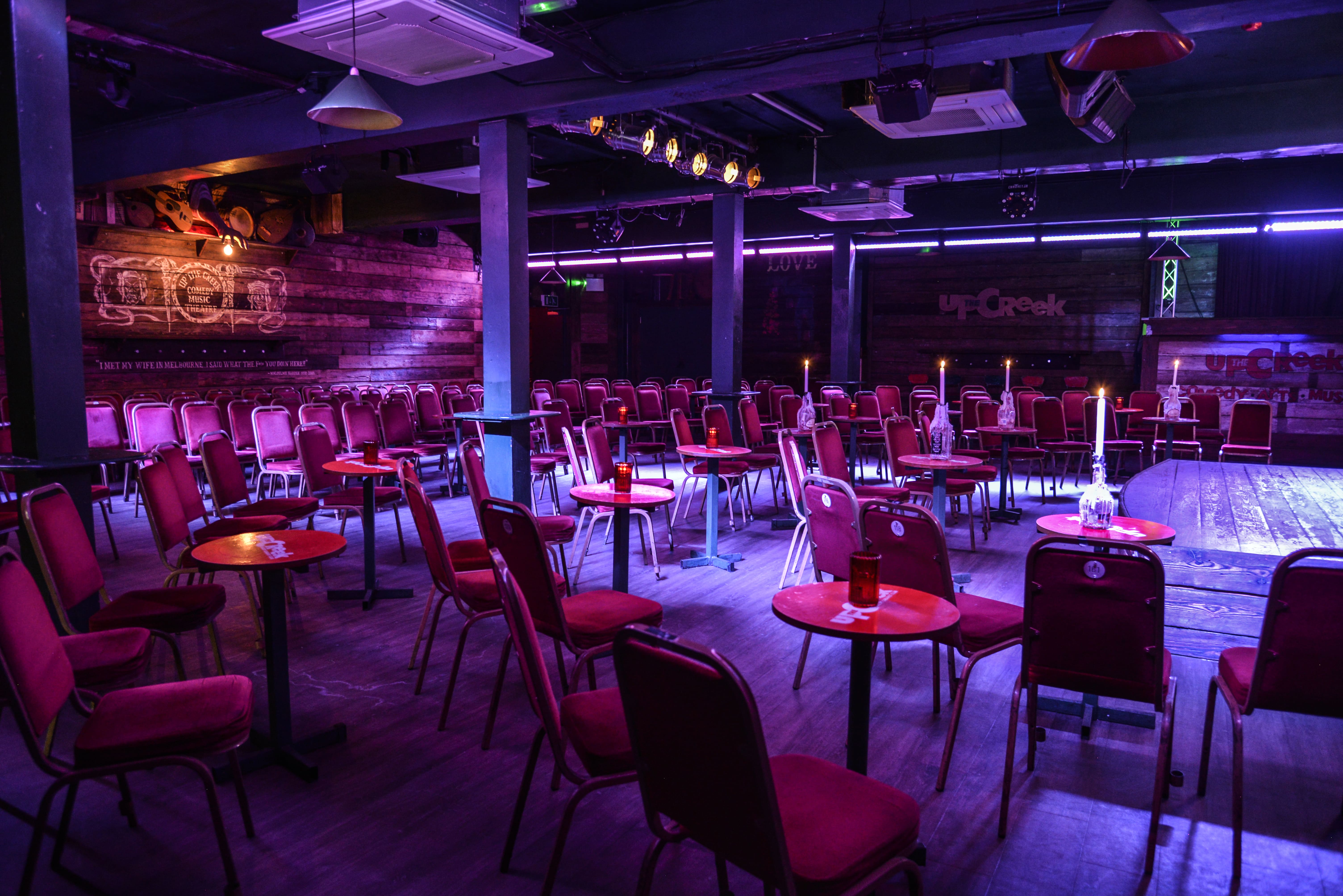 Versatile event space in Up The Creek for workshops and performances with cozy ambiance.