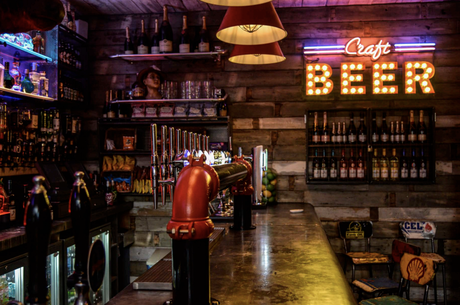 Trendy Up The Creek bar with vibrant decor, ideal for casual networking events.