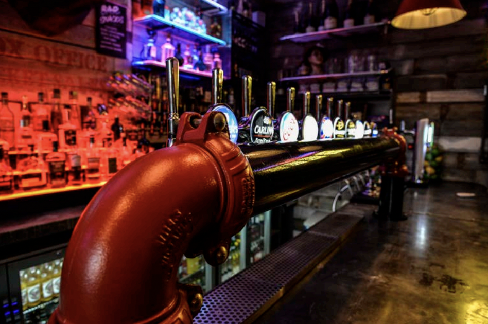 Stylish bar setup at Up The Creek, perfect for networking and social gatherings.