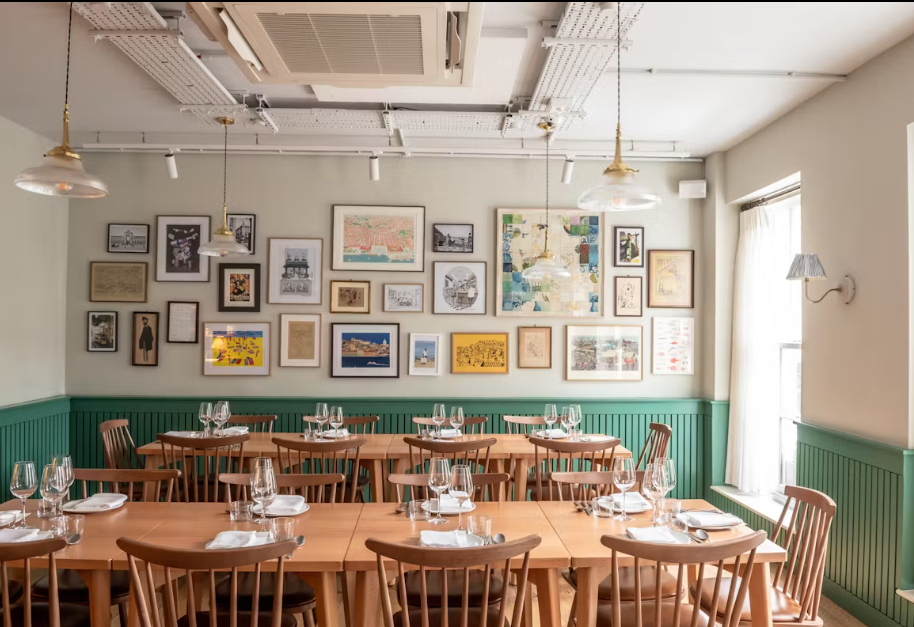 Lisboeta first floor: wooden table setup for private corporate dinners and networking events.