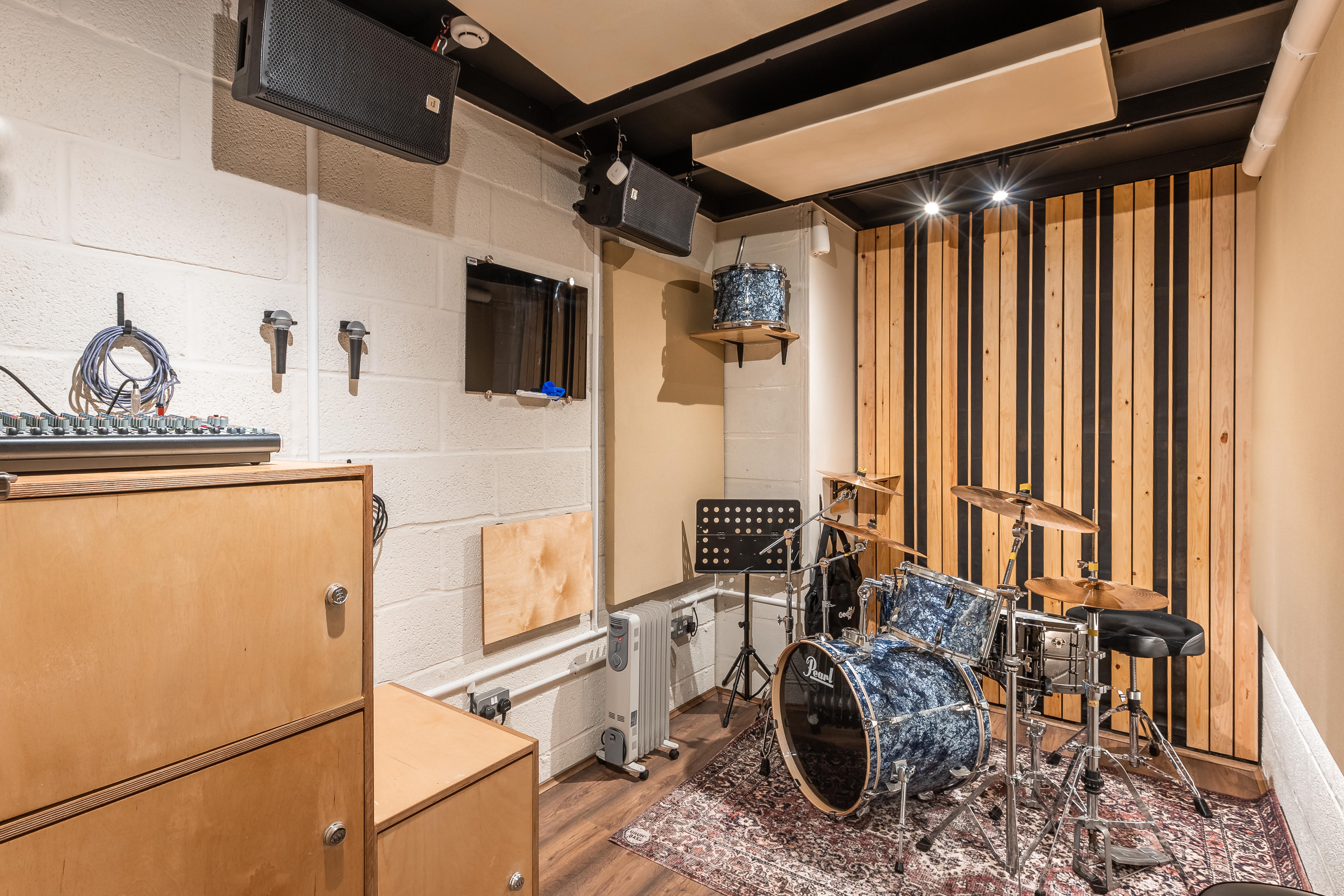 Acoustically treated breakout room at Yellow Hat Studios South for creative sessions or production.
