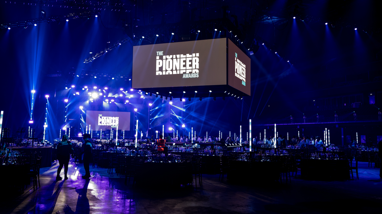 "The Bowl in Co-op Live hosting the Pioneer Awards with dramatic lighting and elegant tables."