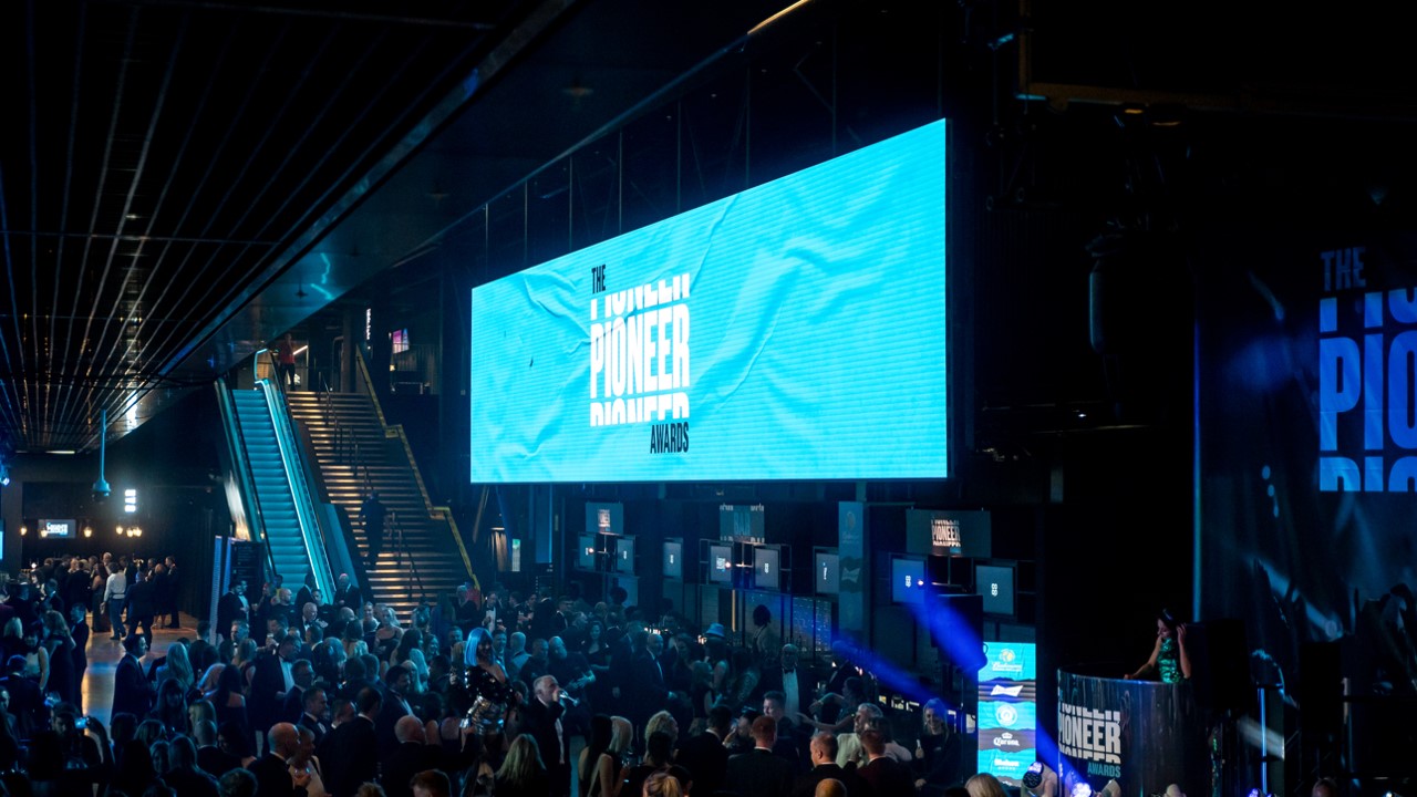 "Vertu Place event space with large screen for networking and presentations in Co-op Live."