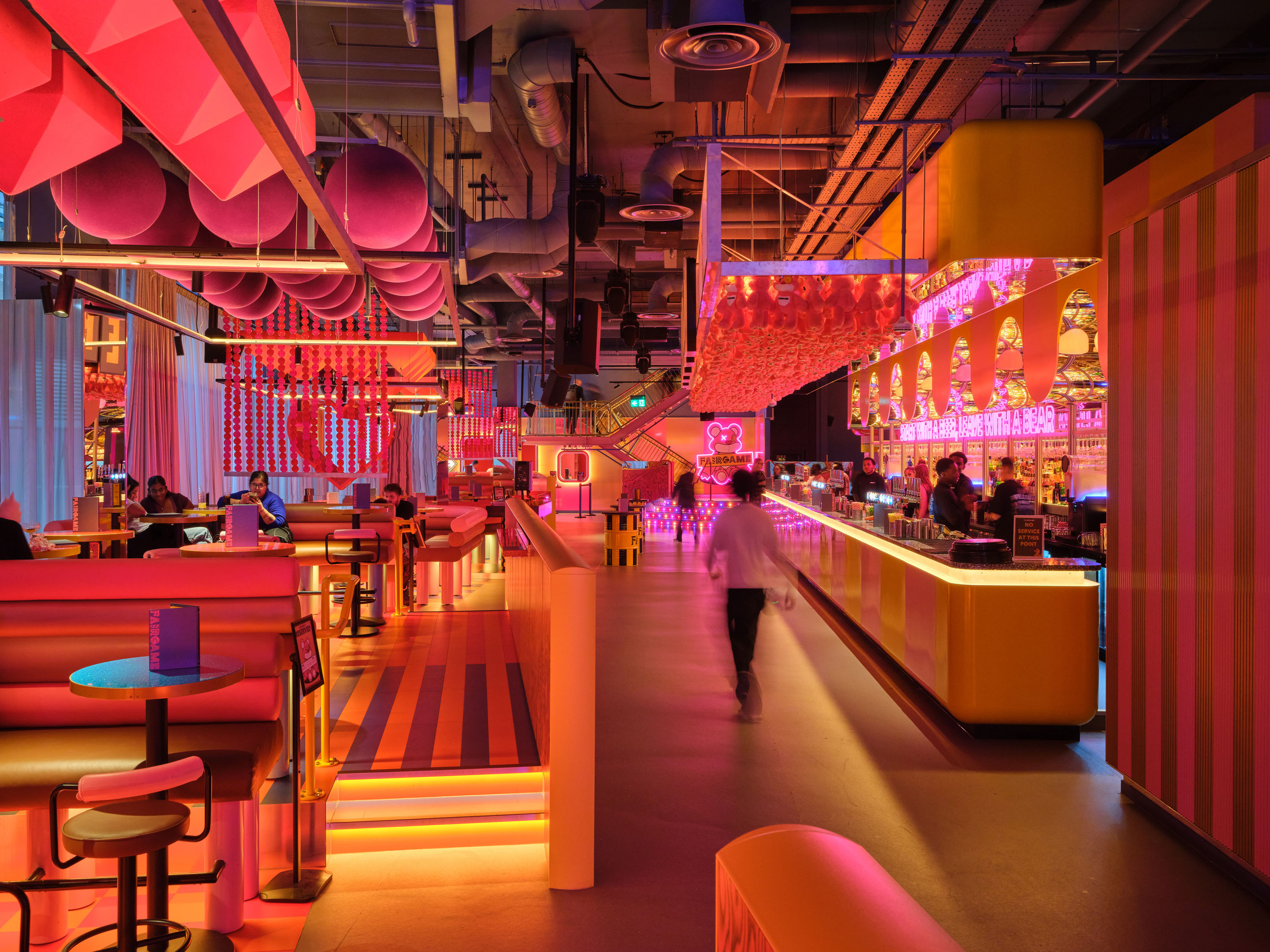 Vibrant event space at FAIRGAME - City for networking and celebrations, featuring colorful decor.