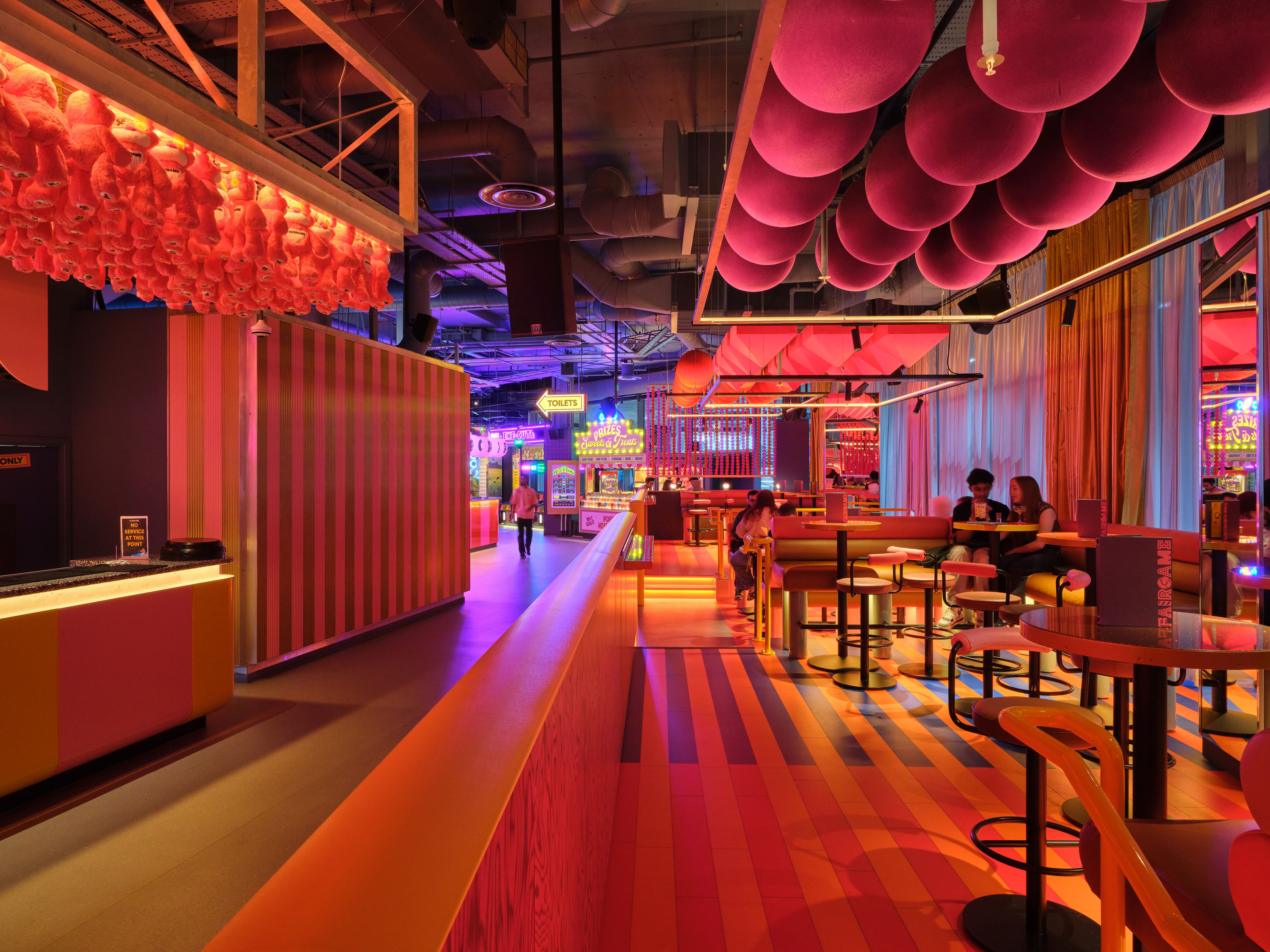 Vibrant exclusive hire venue with colorful decor for dynamic events and parties.