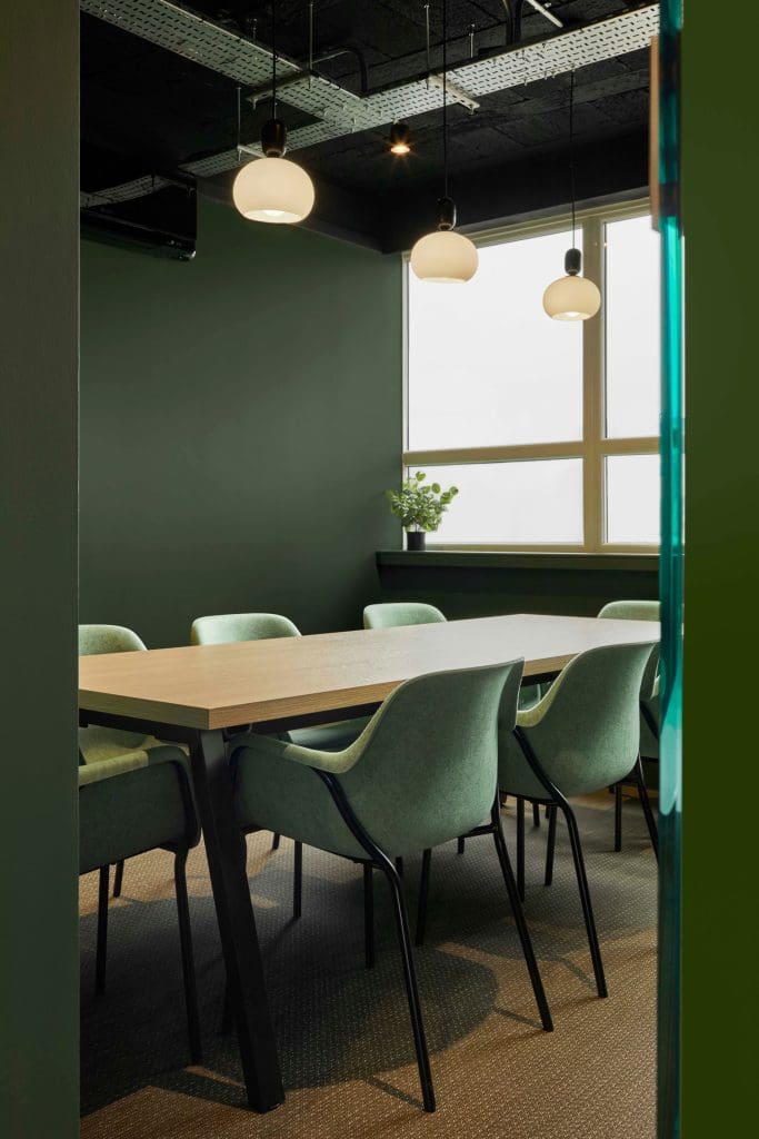 Modern boardroom meeting room for corporate strategy sessions and client presentations.
