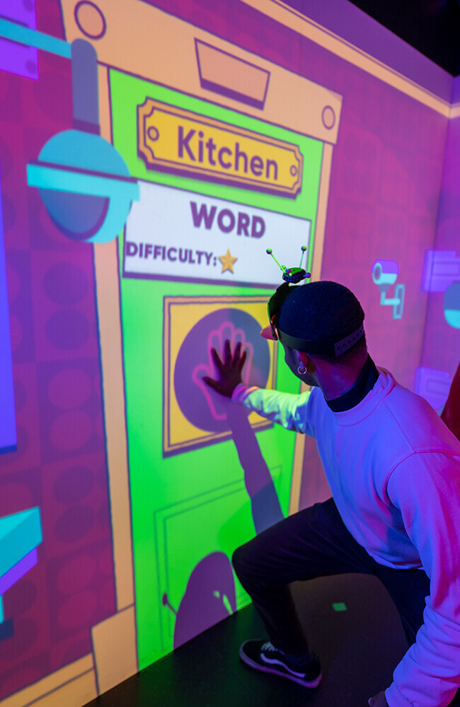 Immersive Gamebox at Gravity MAX: vibrant interactive setup for team-building events.
