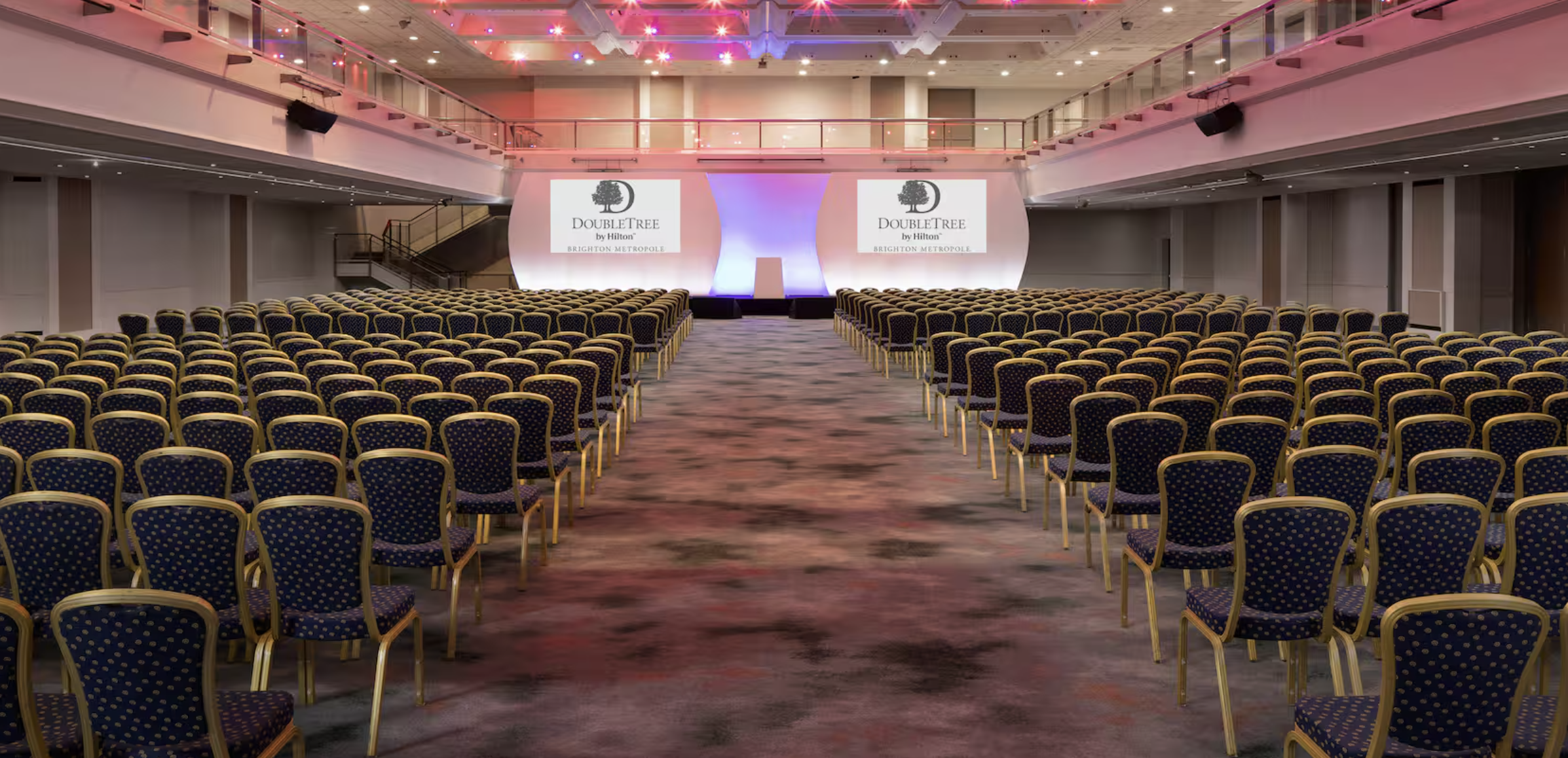 Spacious conference hall at DoubleTree Brighton for presentations and networking.