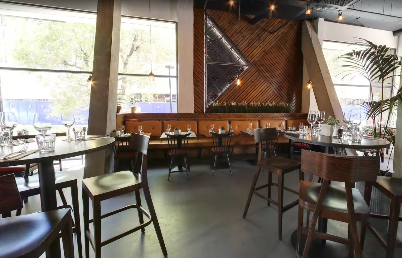 Modern Leadbelly's sports bar with banquette seating for corporate happy hour or networking events.
