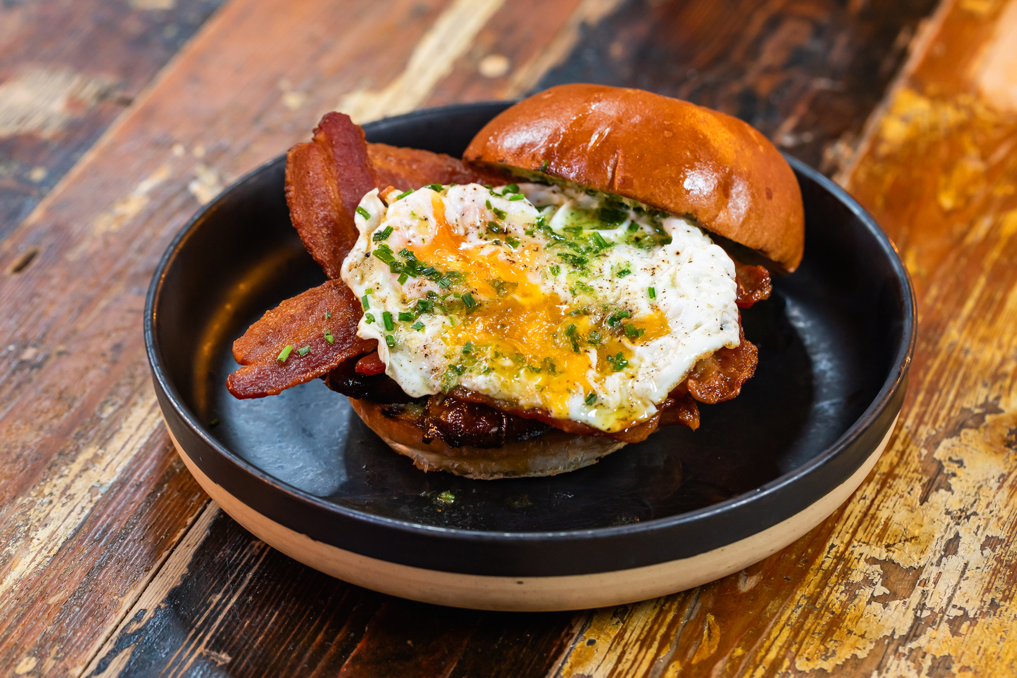 Gourmet breakfast slider at Leadbelly’s sports bar, ideal for casual networking events.