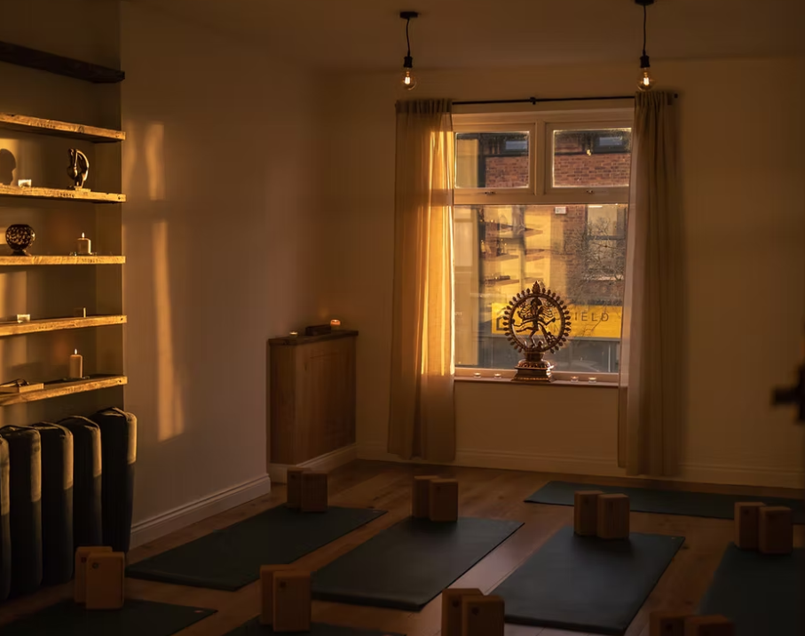 Minimalist yoga studio for corporate wellness retreats and mindfulness sessions.