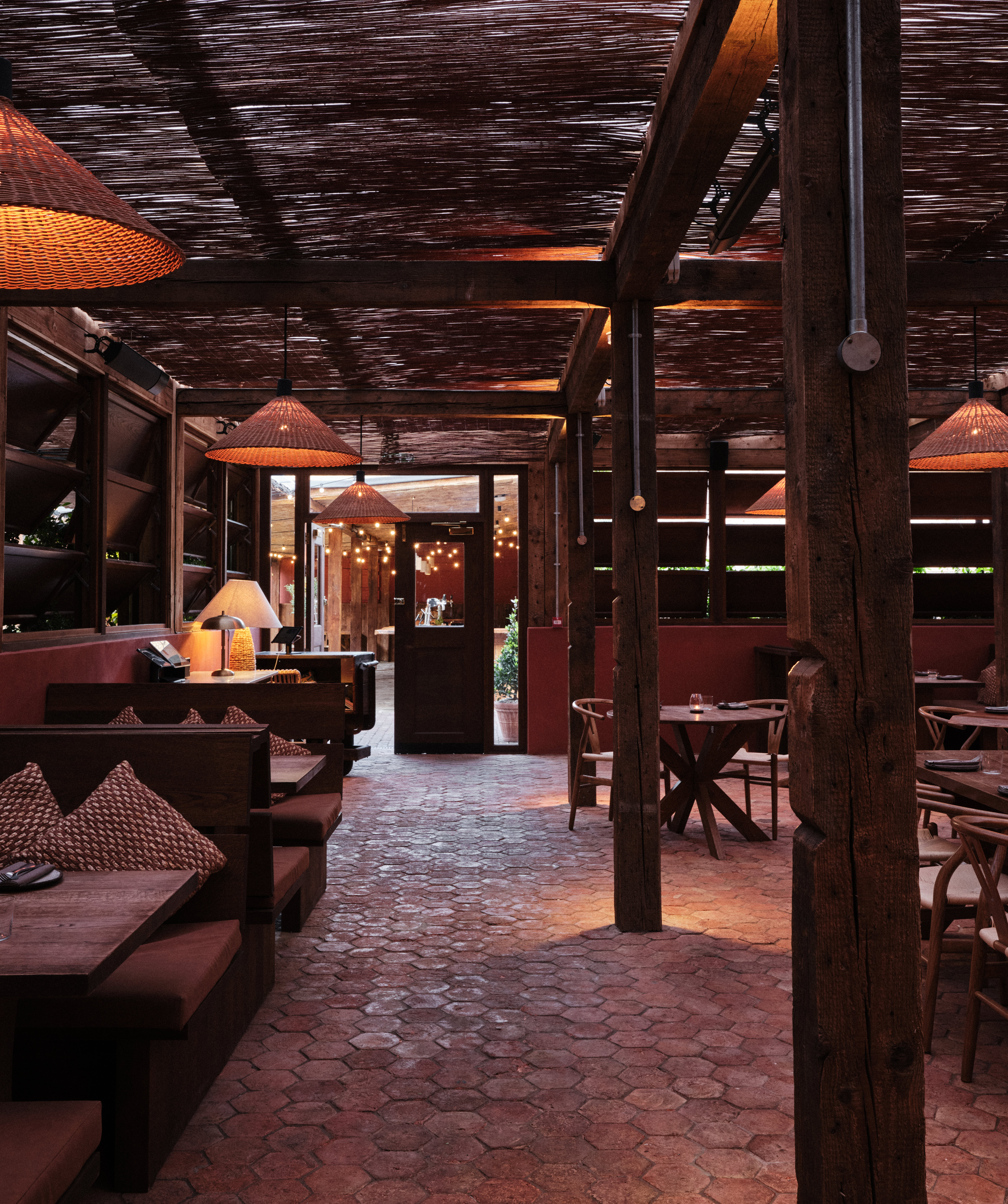 Cozy Pyro Restaurant with warm lighting, ideal for gatherings and meetings.