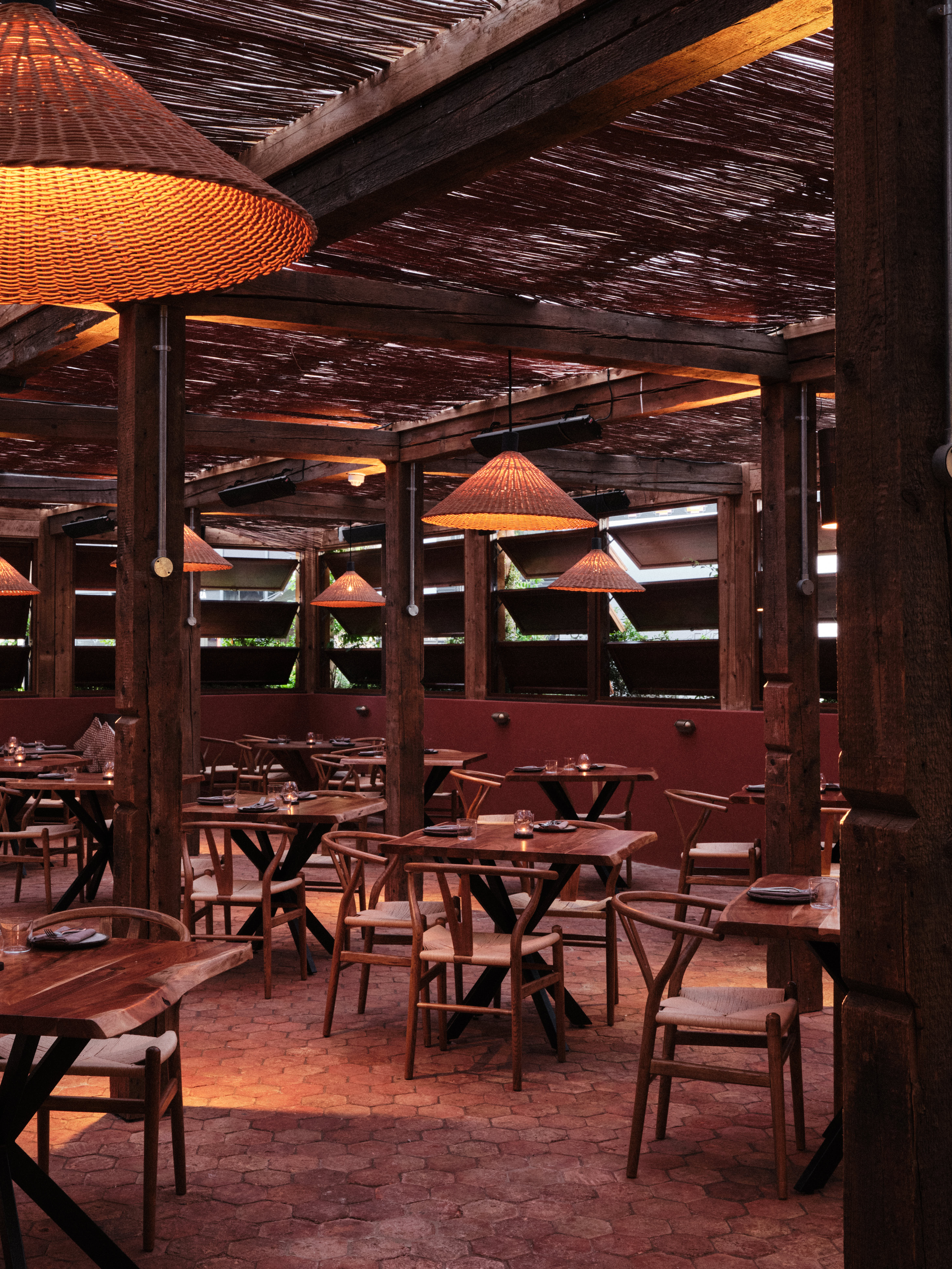 "Stylish Pyro Restaurant dining space with wooden beams for intimate gatherings and events."