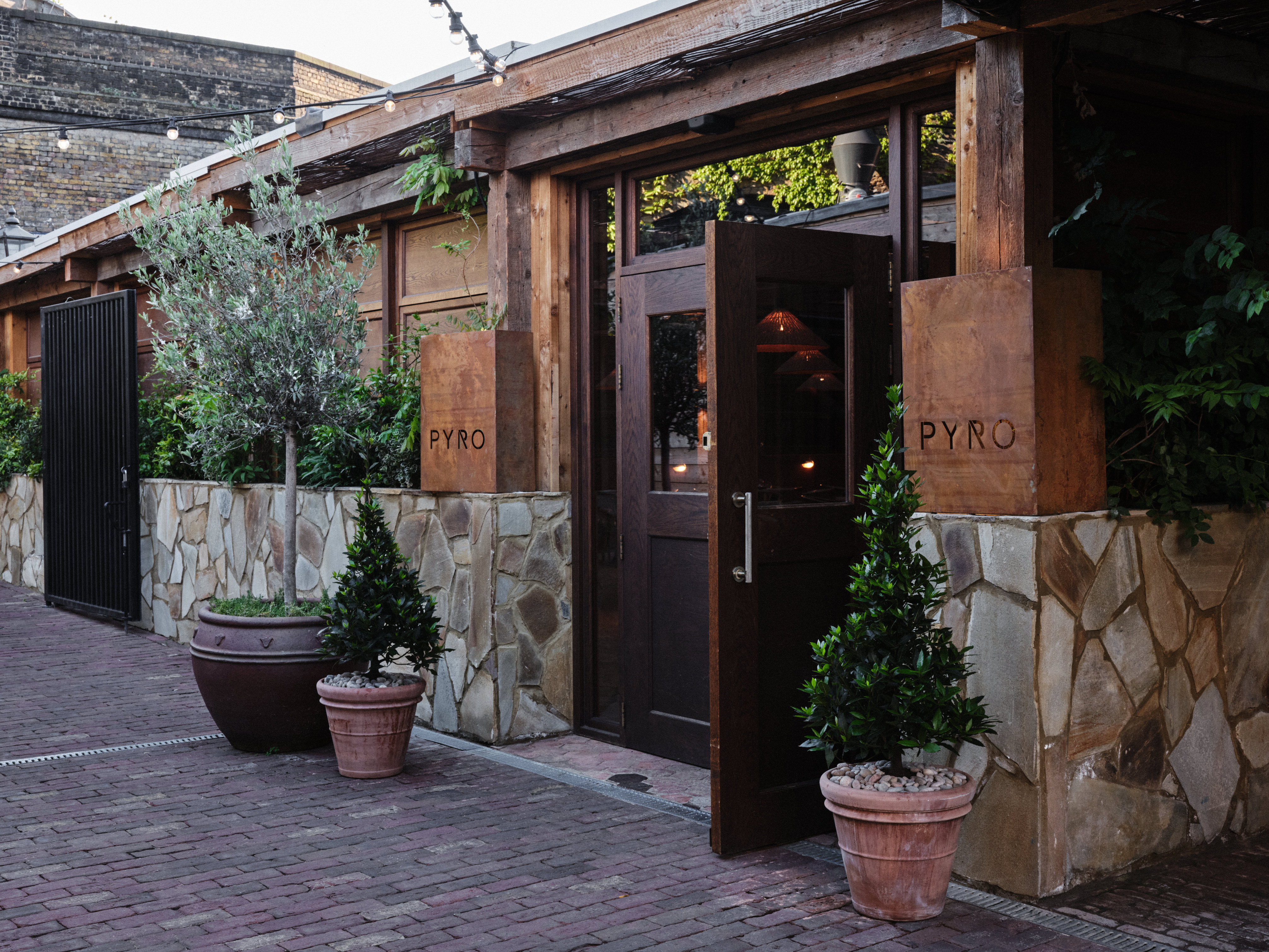 Charming Pyro Restaurant venue with inviting entryway, perfect for events and gatherings.