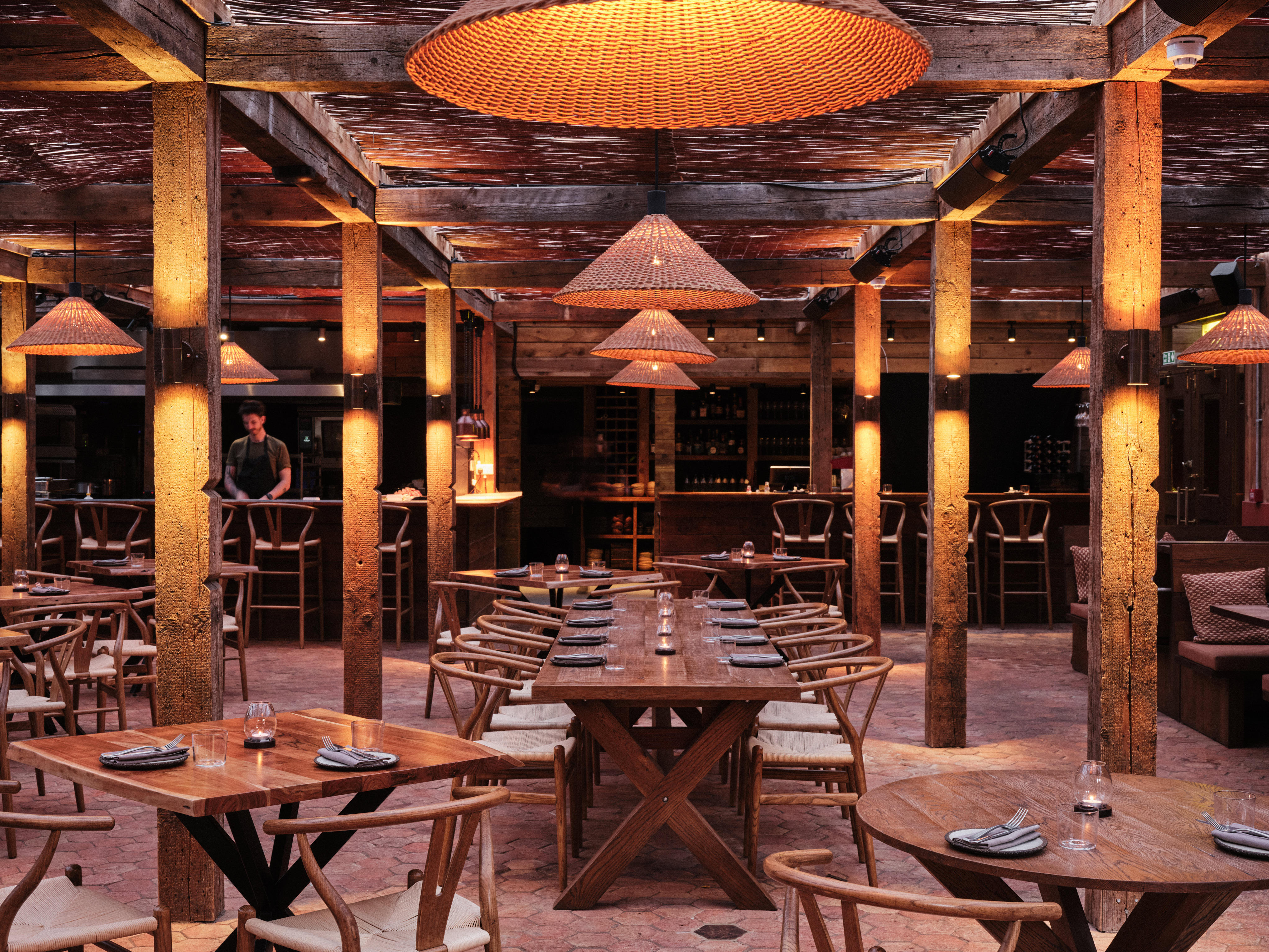 Stylish Pyro Restaurant with warm lighting, perfect for networking events and casual dining.