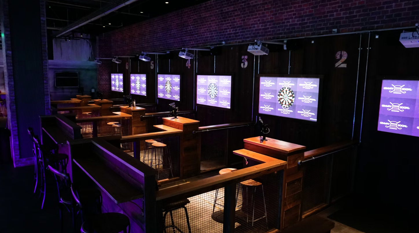 "Gravity Wandsworth event space with interactive stations, ideal for team-building and networking."