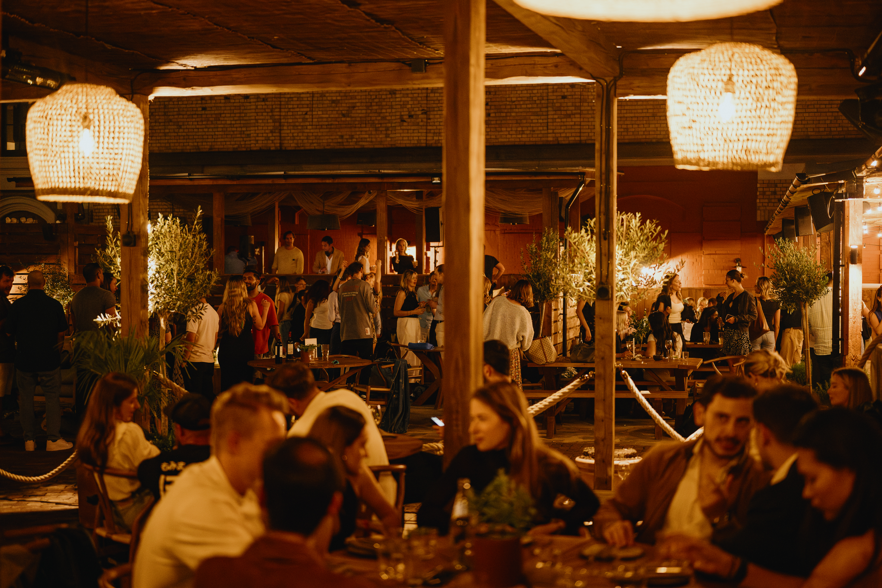 Vibrant Pyro Full Venue with lively guests at a networking event and social gathering.