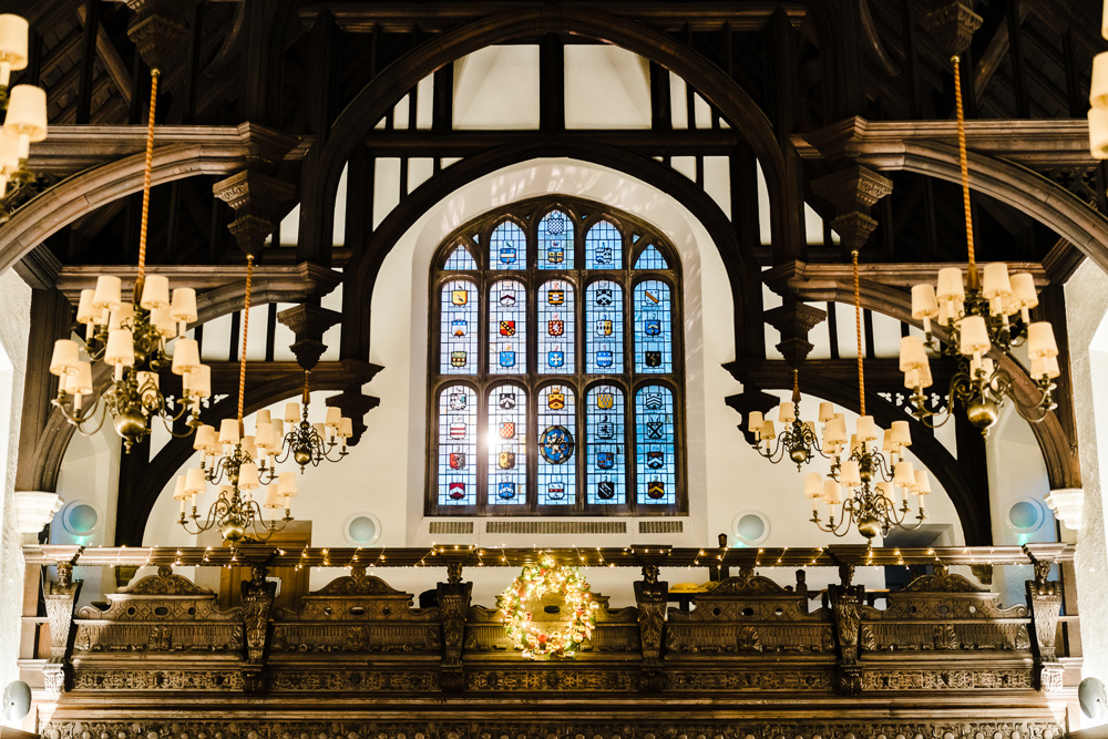 Elegant Christmas party venue with stained glass window at Gray's Inn.