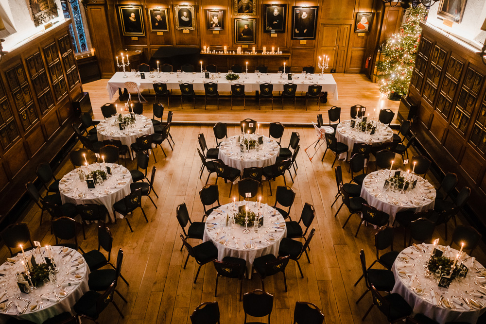 Elegant banquet setup for Christmas parties at Gray's Inn with candlelit tables.