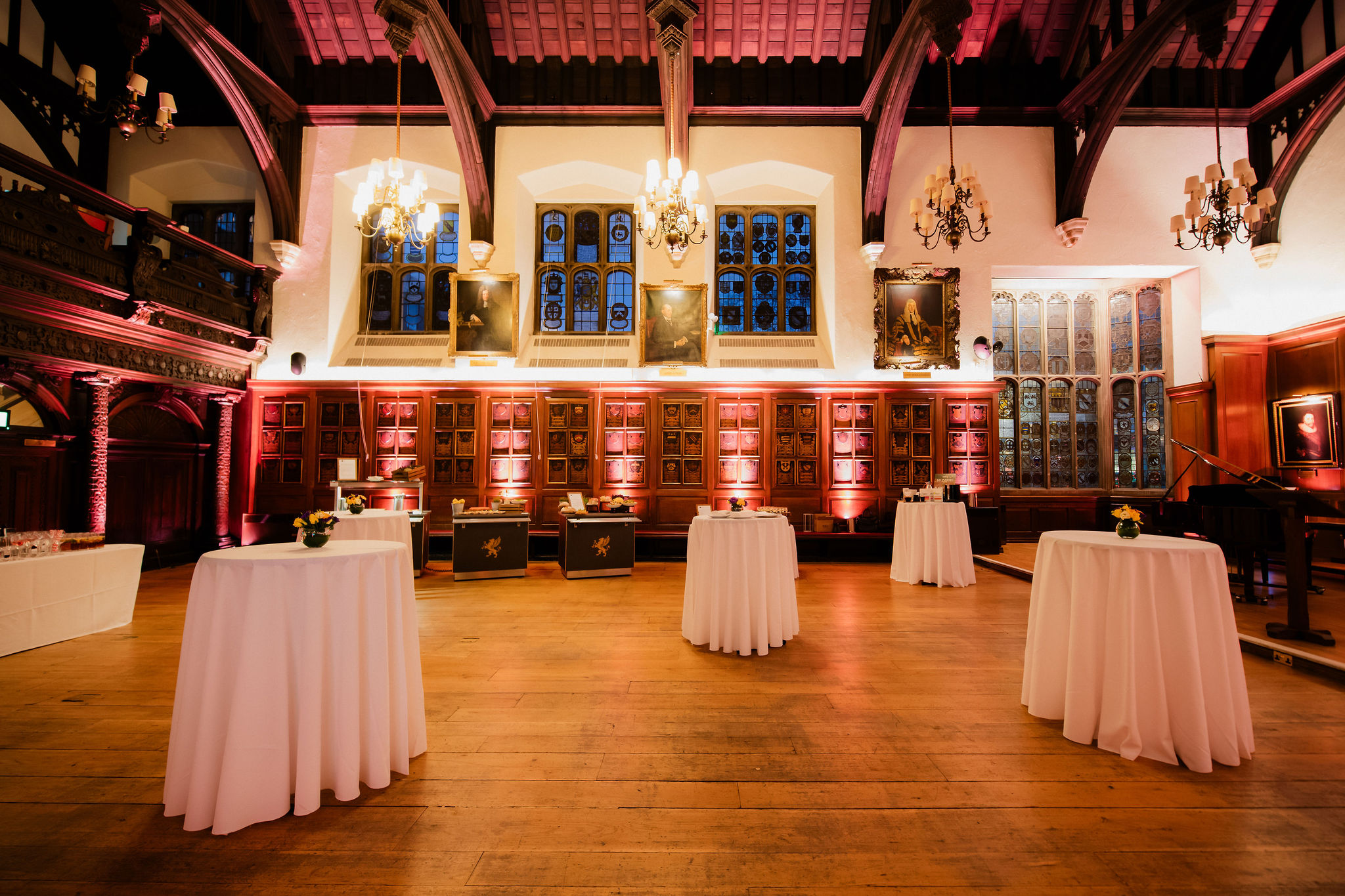 "Christmas party at Gray's Inn with elegant round tables and warm lighting"