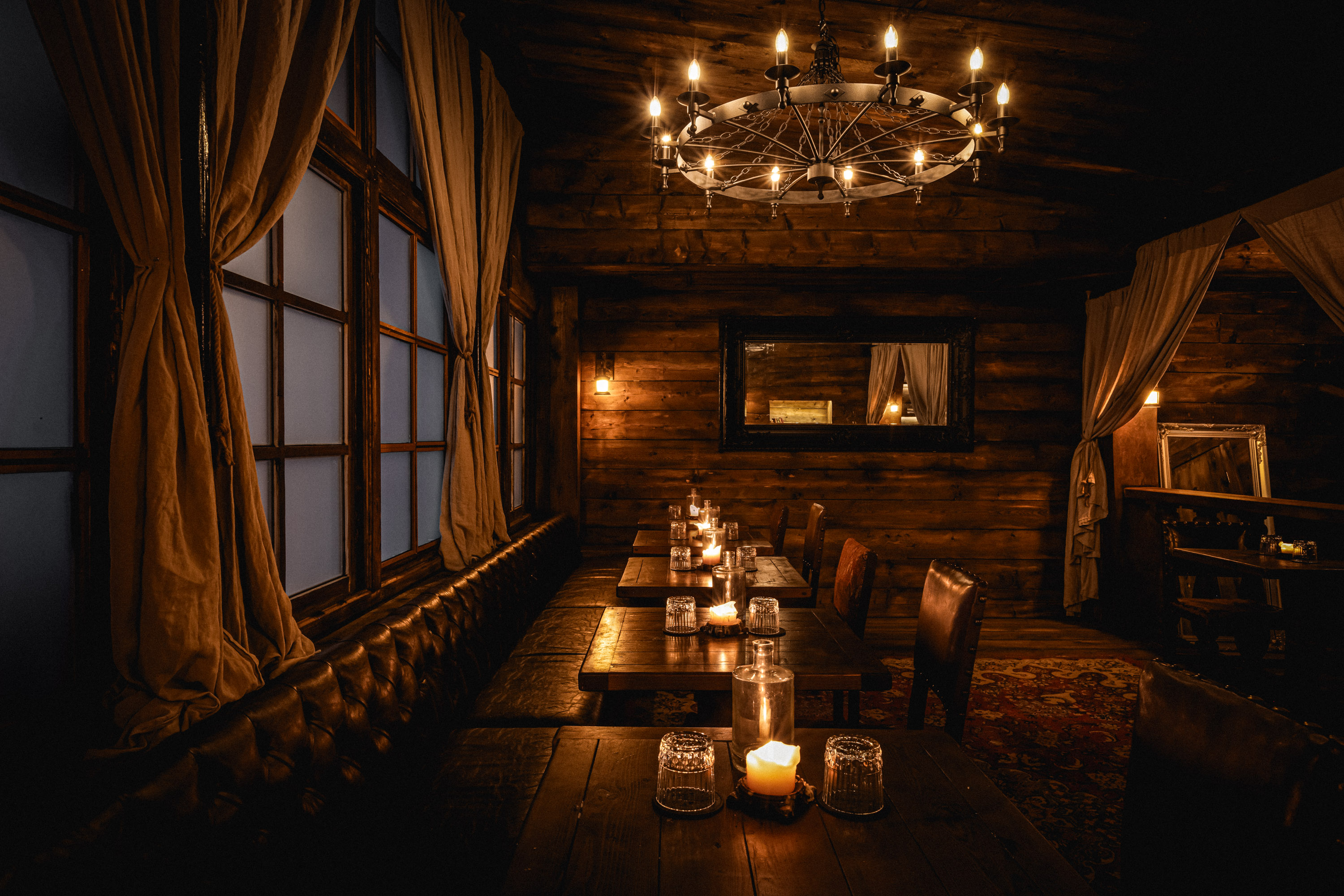 Captain’s Quarters luxury boardroom dinner venue with ambient lighting for VIP client receptions.