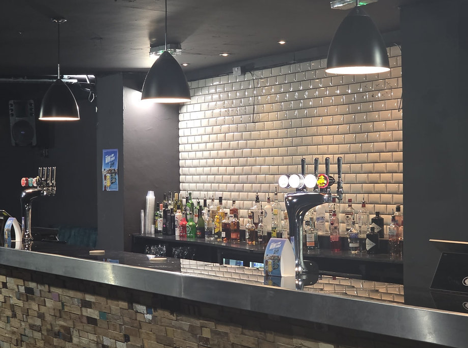 Modern bar at Sigma Club venue, perfect for casual networking reception and corporate events.