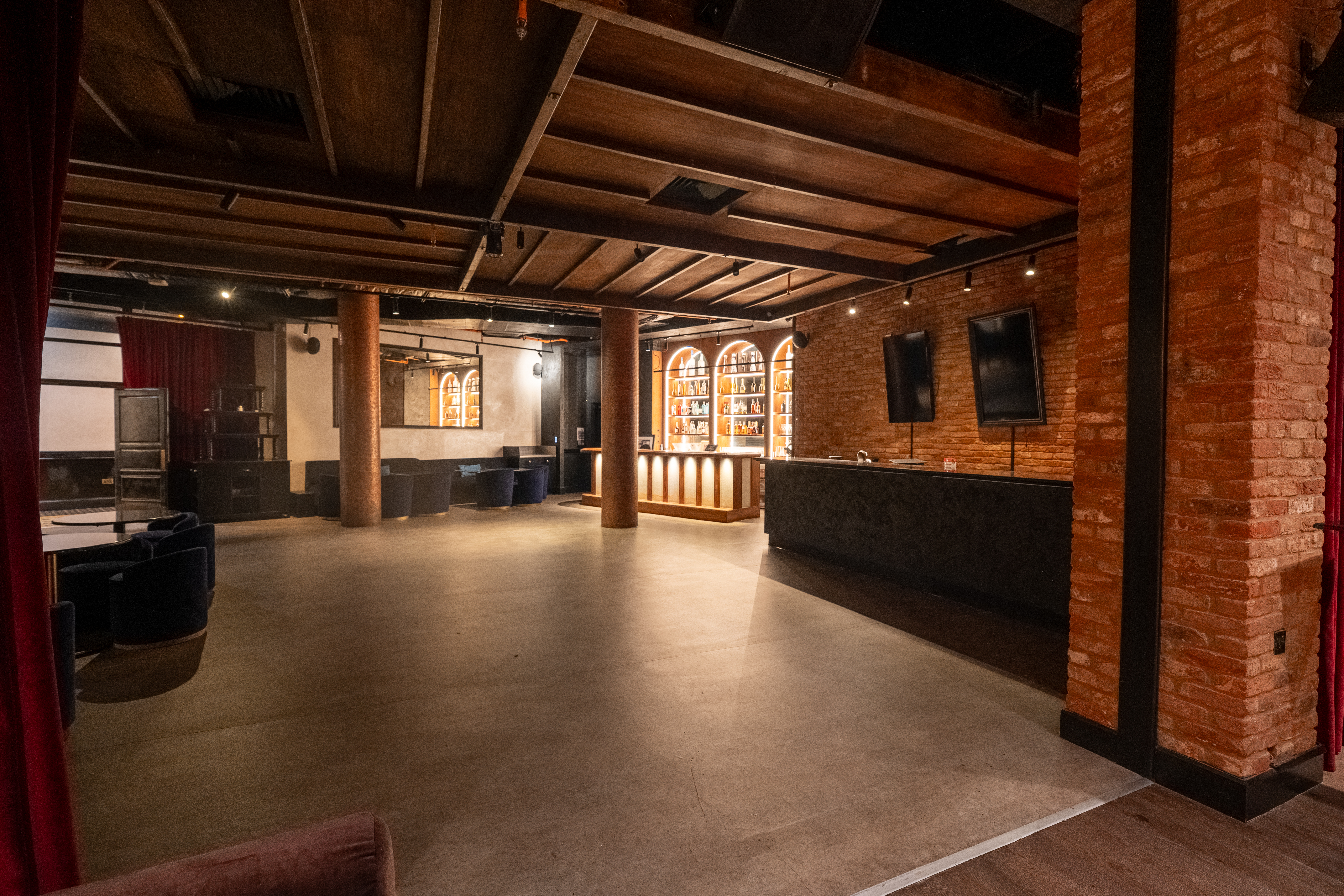 Versatile event space at Parallel 45, featuring exposed brick for meetings and receptions.