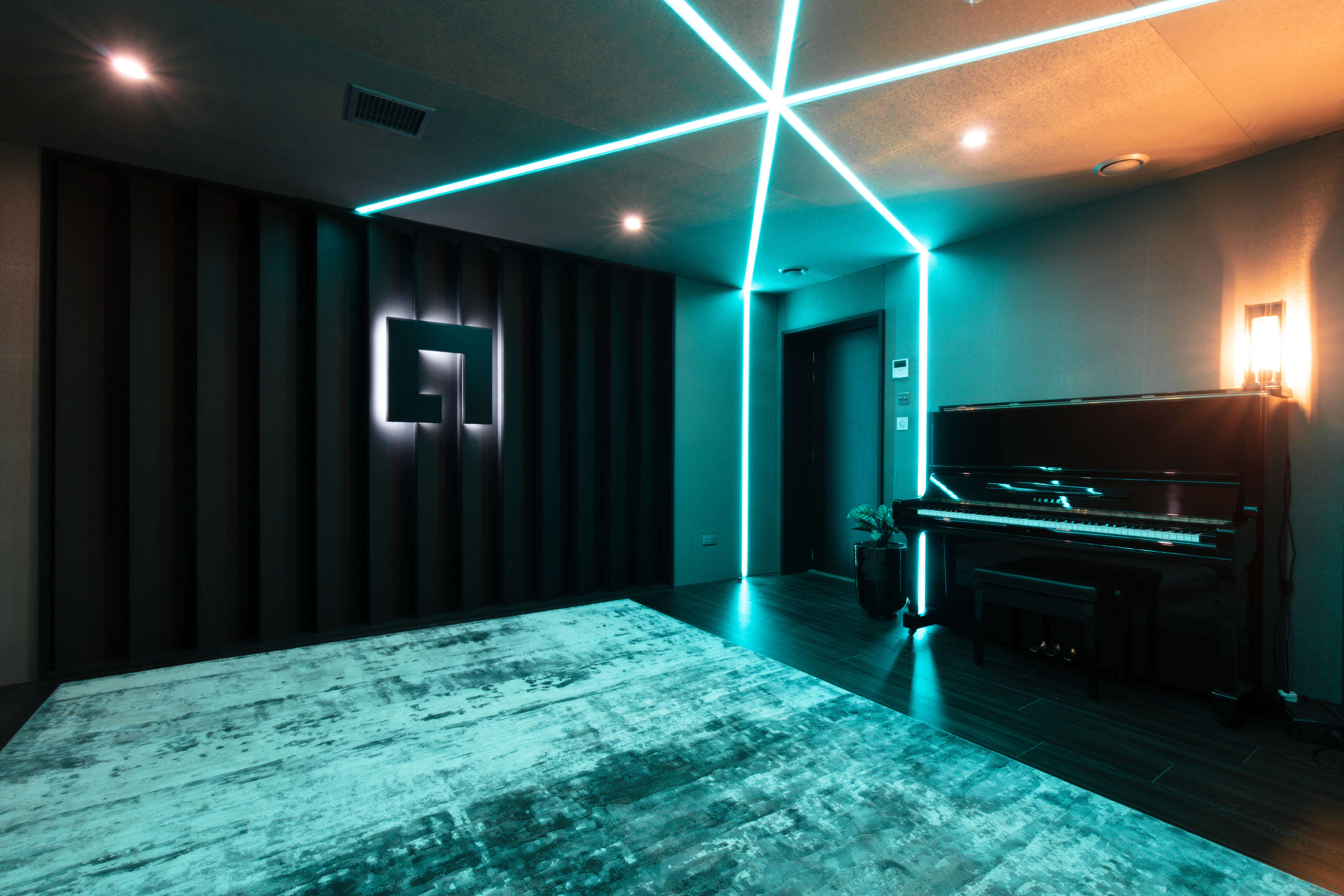 "Modern West London studio with piano, ideal for intimate events and brainstorming sessions."