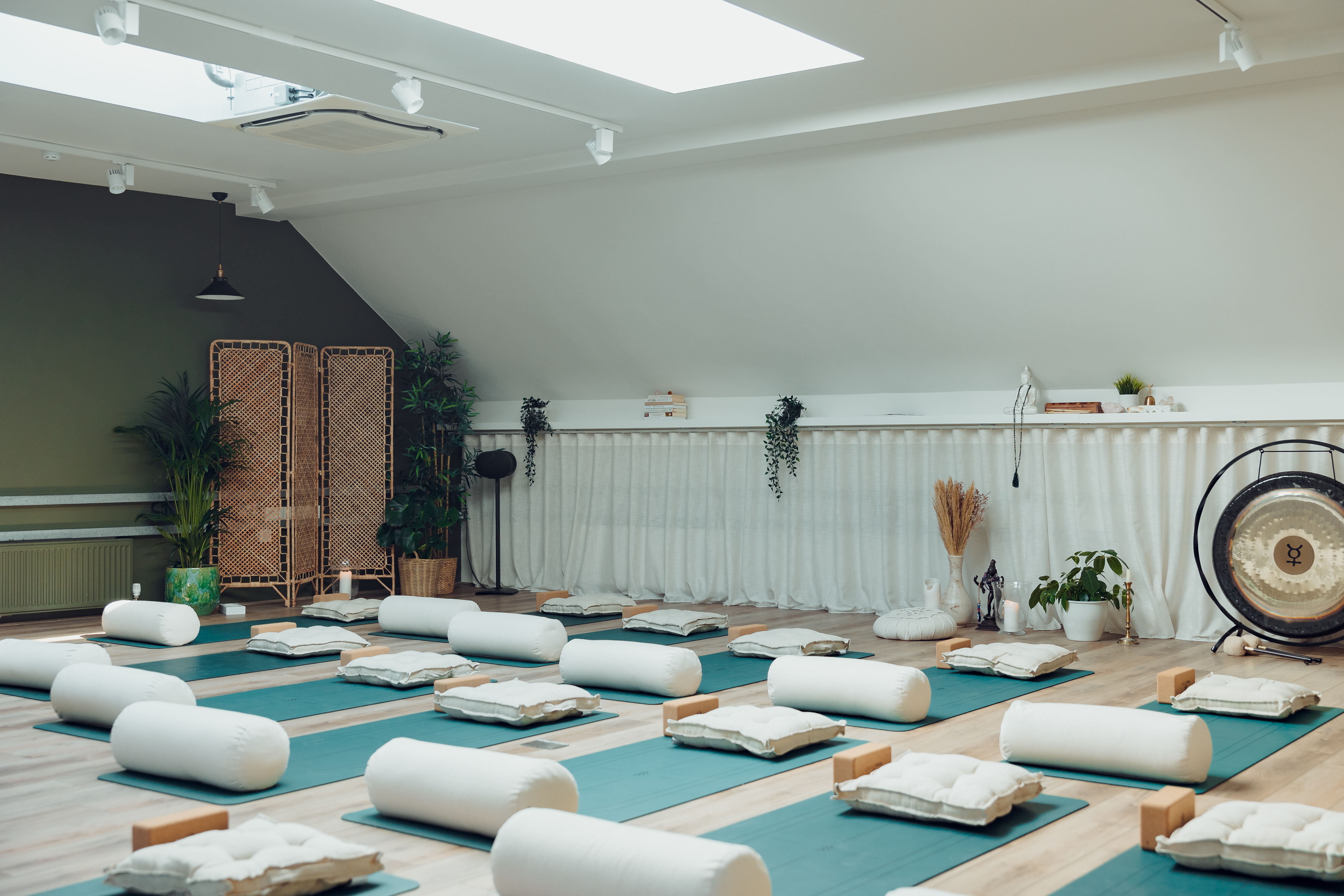 Wellness studio for corporate retreats and mindfulness workshops with flexible floor plan.