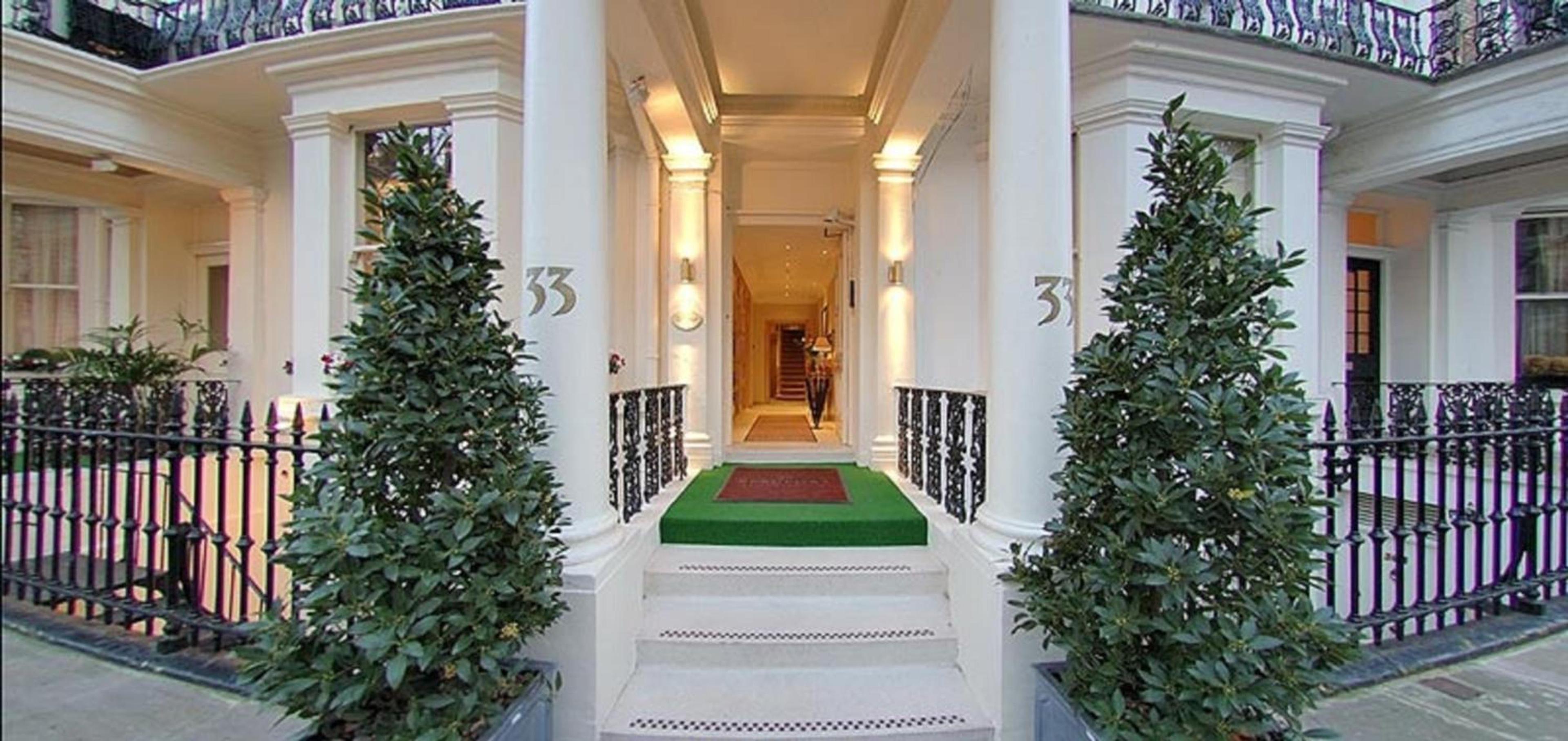 The Beaufort hotel entrance, featuring classic architecture for board meetings and networking.