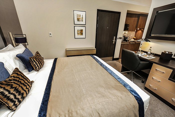 Hotel studio suite with desk for business travel and corporate events.