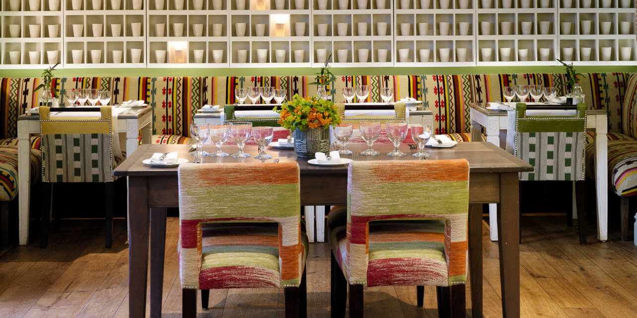Potting Shed restaurant dining room with vibrant seating for networking dinners and events.