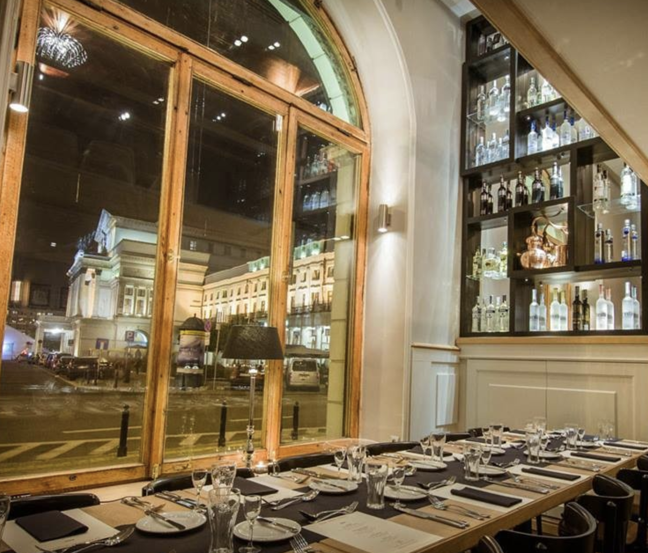 Elixir Restaurant: Sophisticated illuminated bar for corporate dinners and VIP reception events.
