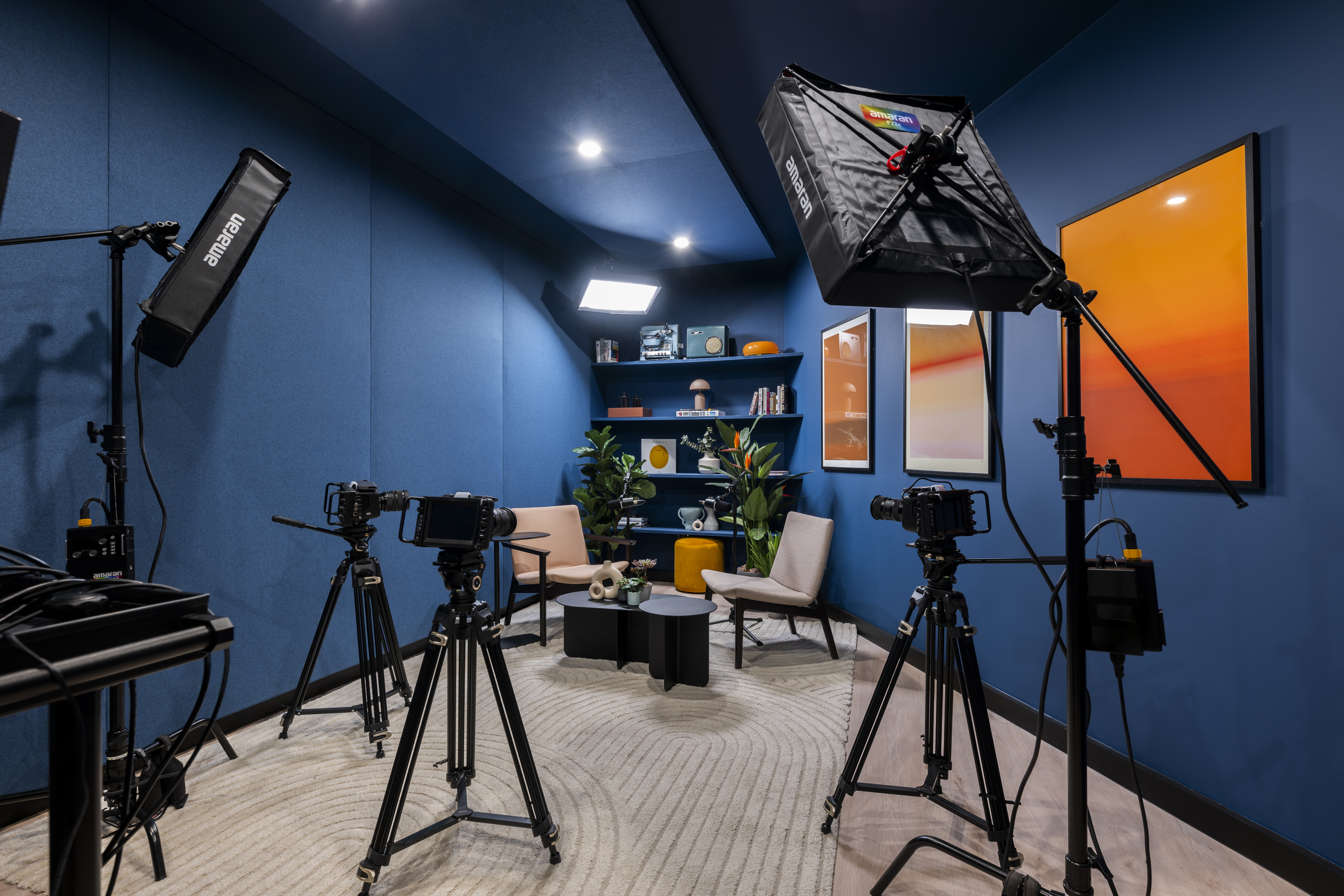 Video conferencing setup in Qube Elephant Lounge for hybrid meetings and events.