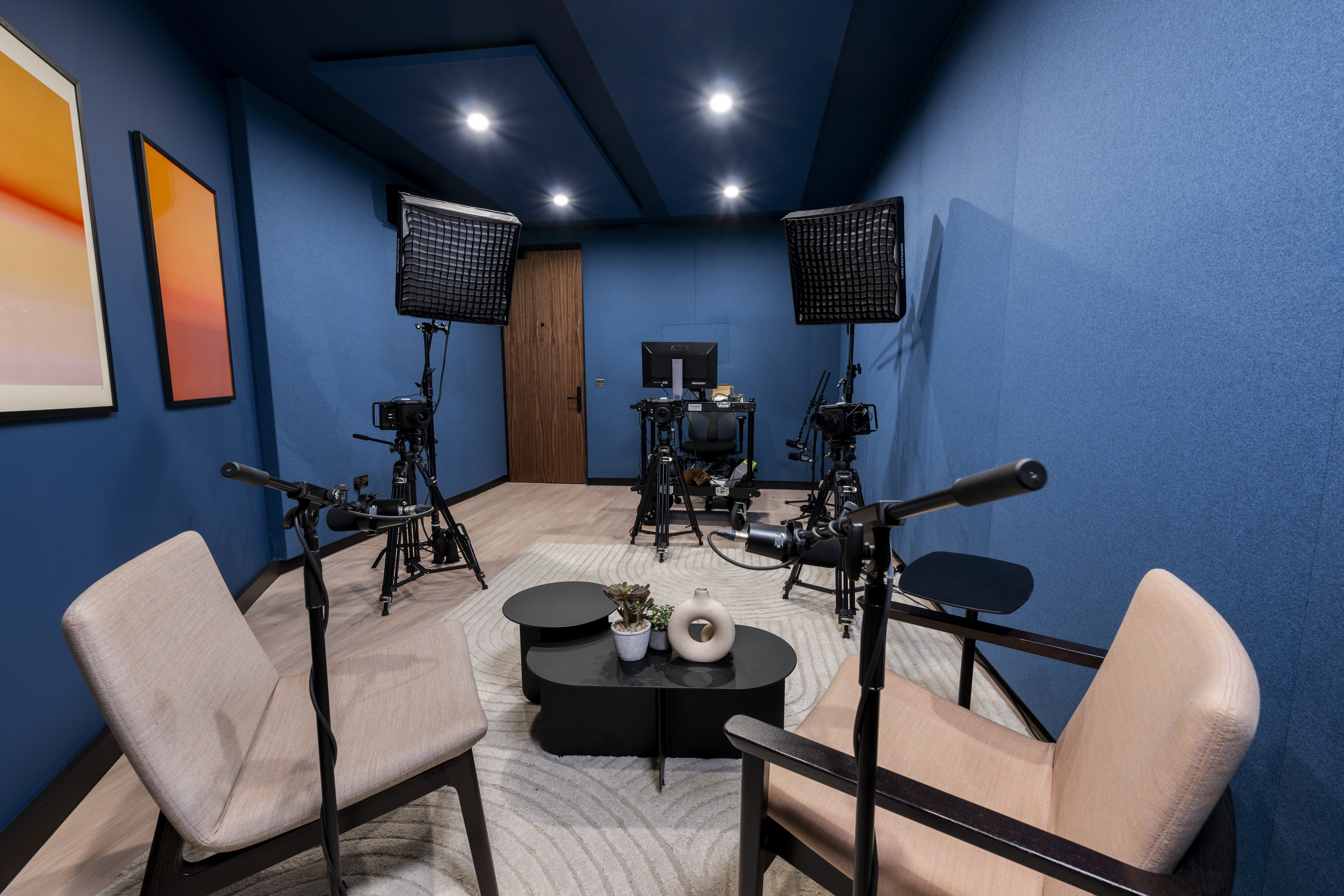 Pod/Content Studio at Qube Elephant Lounge, soundproof space for interviews and video production.