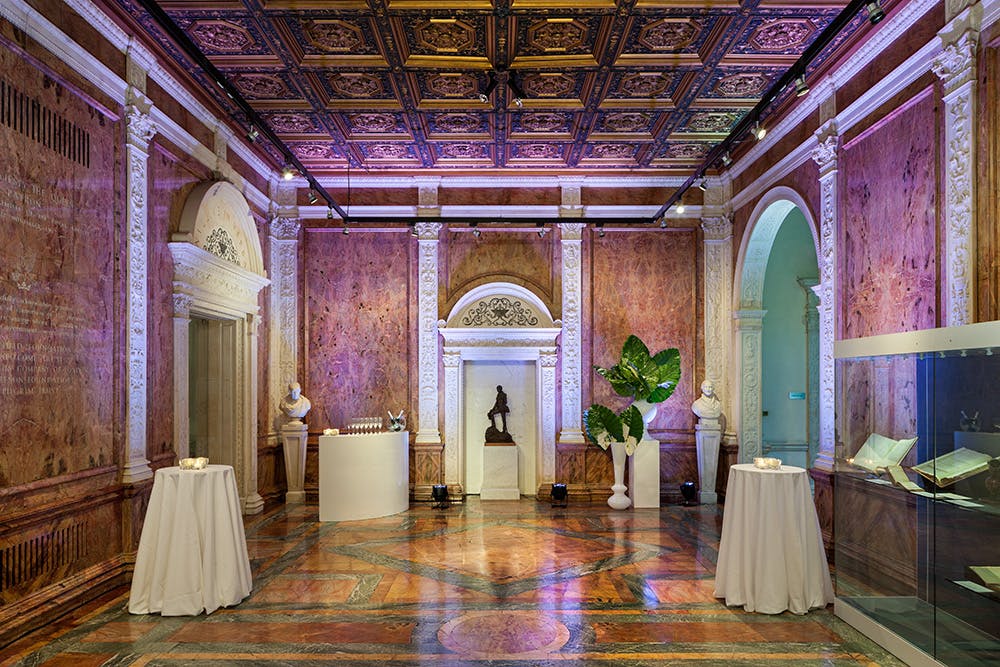 Historic marble event space for networking and cocktail reception at Carlton Terrace.