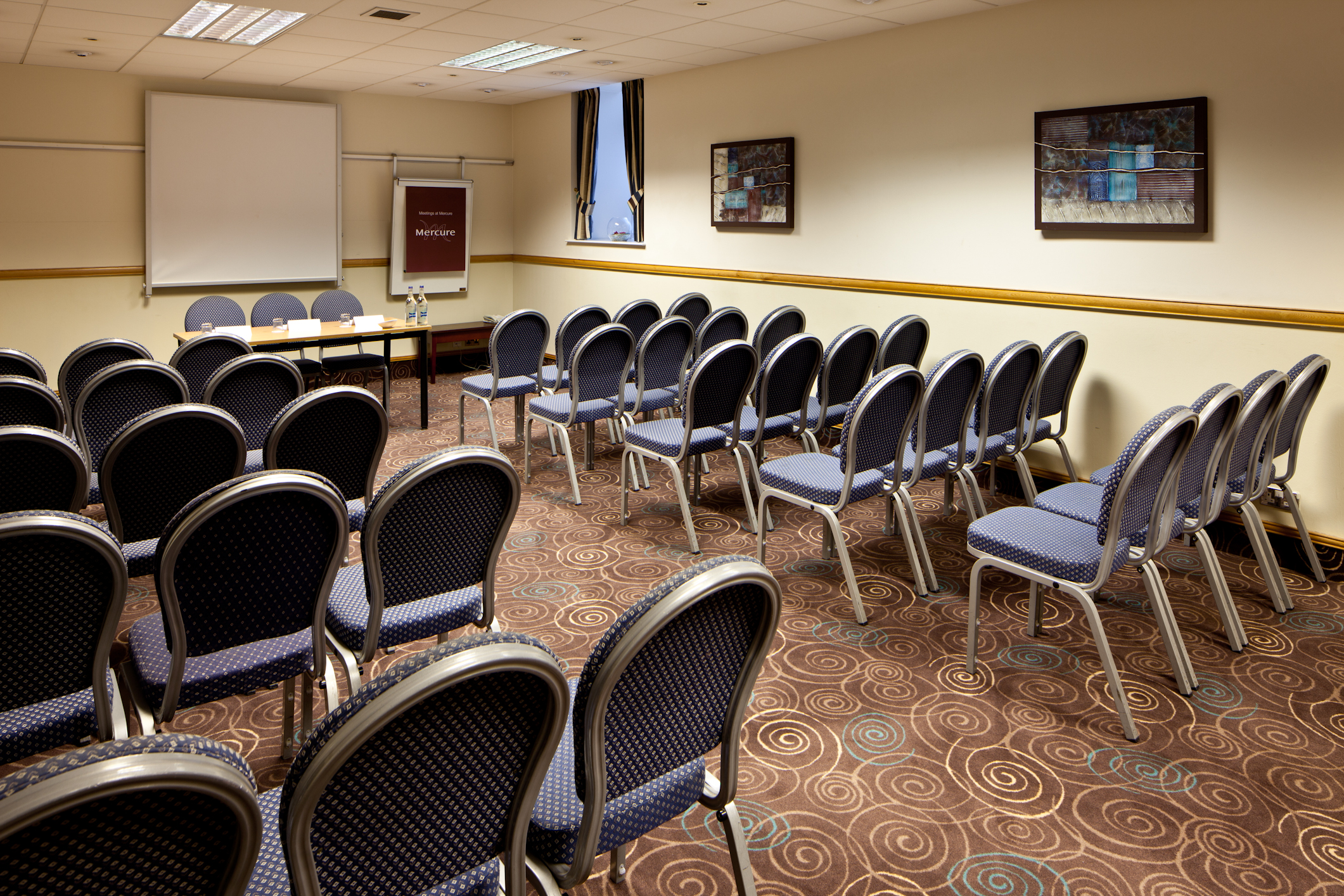 Theater-style Broker Suite at Mercure Glasgow City Hotel for professional business conferences.