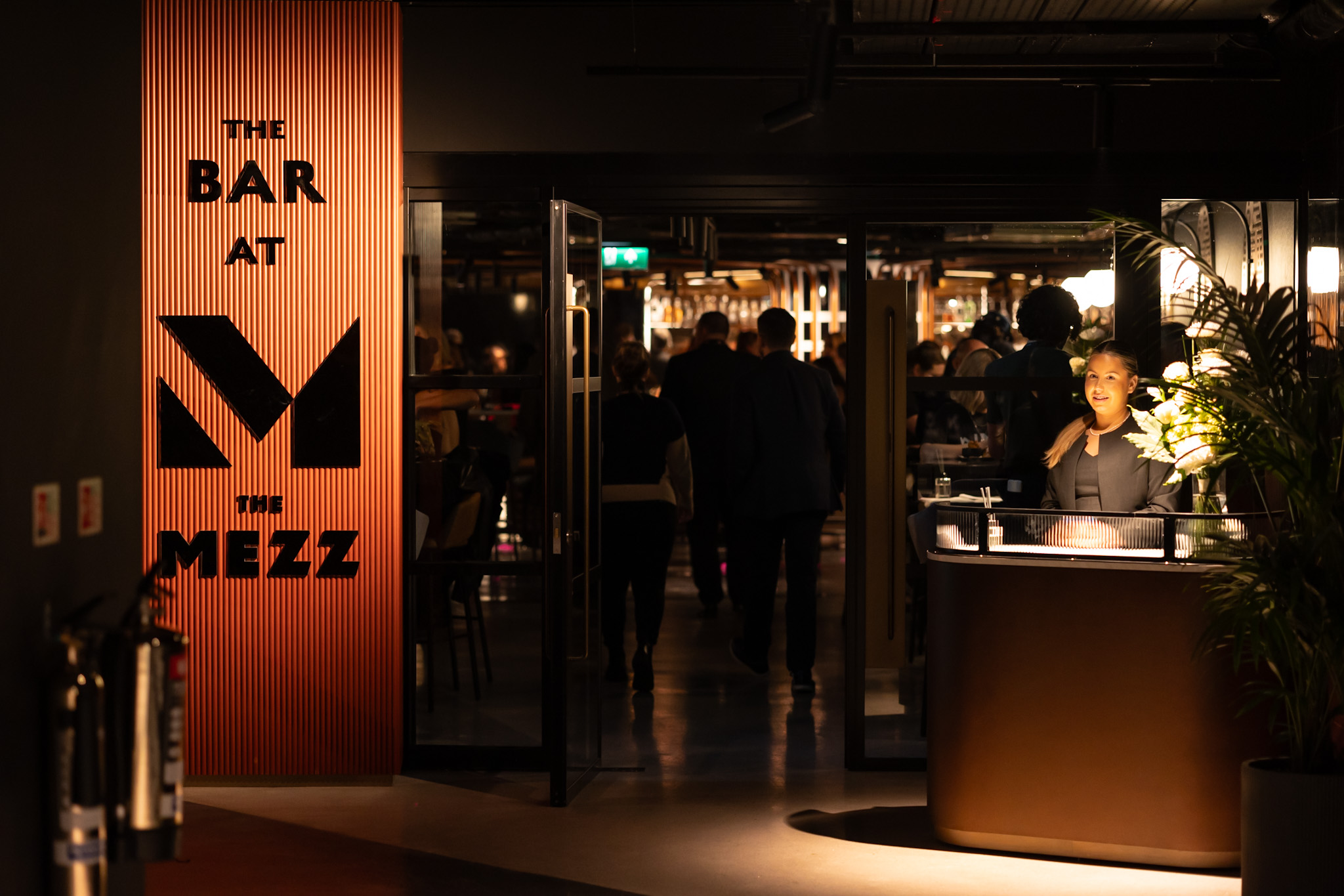 Stylish bar area at The Mezz, AO Arena, perfect for networking events and social gatherings.
