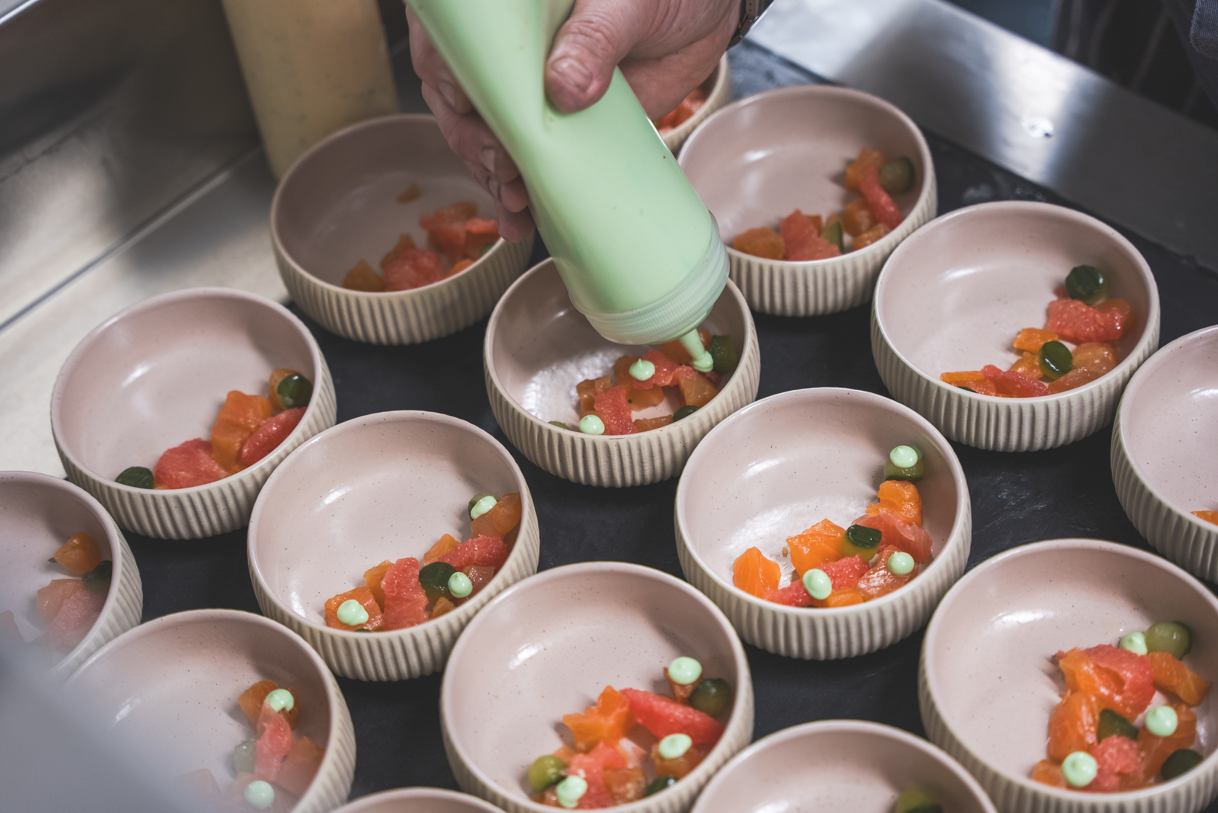 Elegant food presentation at The Mezz, AO Arena for a high-end event.