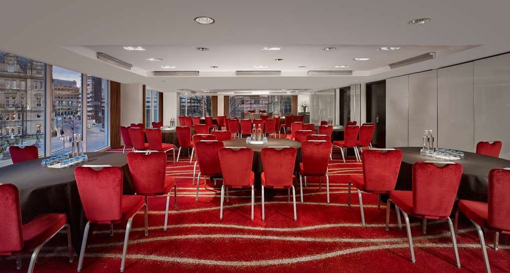 Park Plaza Leeds round-table conference room with red carpet for business meetings and events.