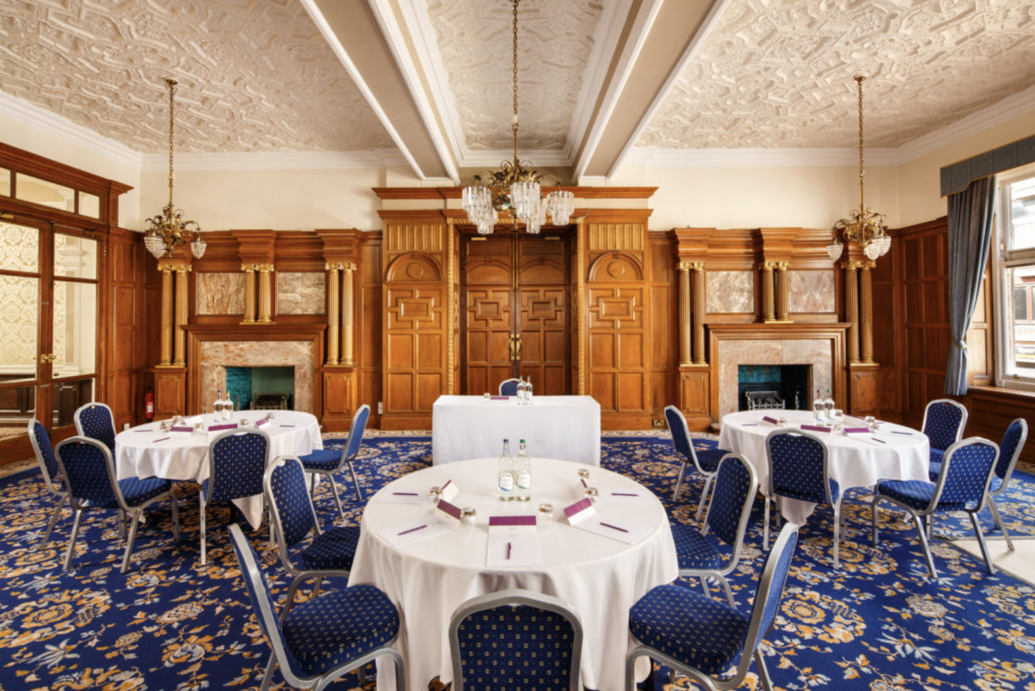 Alexandra Room at Grand Hotel Leicester: wood-paneled banquet setup for corporate events and meetings.