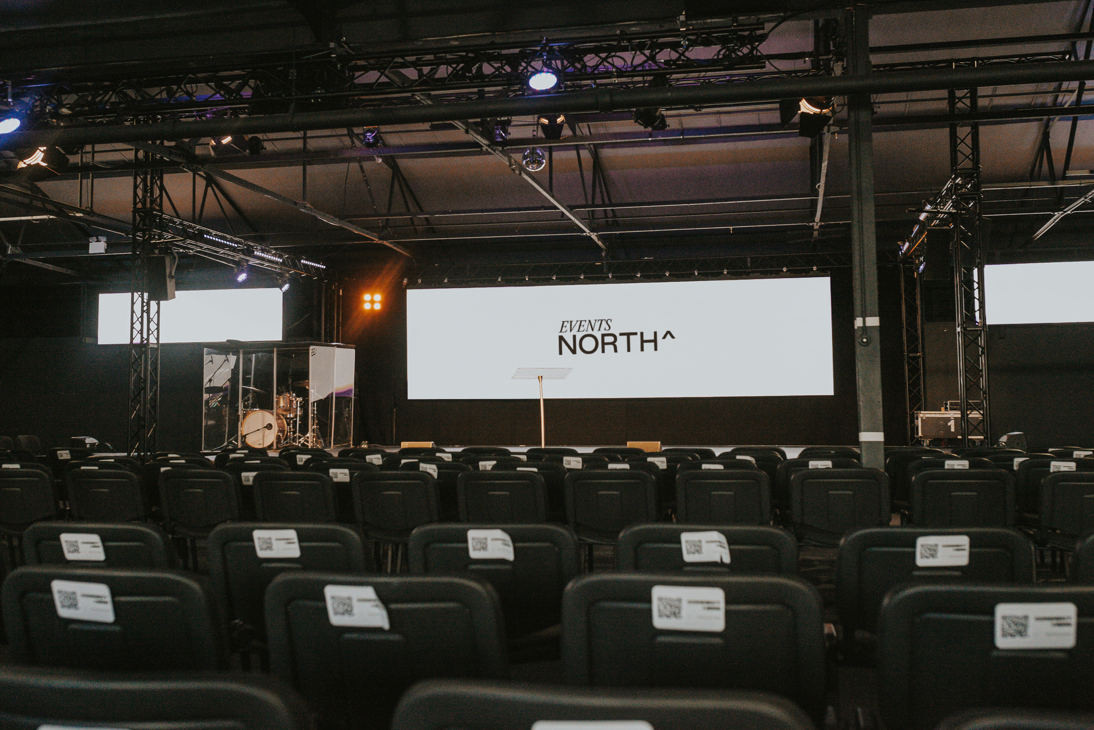 Modern Main Auditorium plenary setup for professional conferences and corporate events.