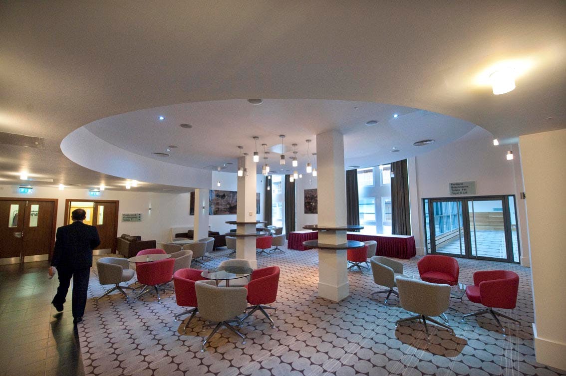 Plenary Room with pillars at John McIntyre Conference Centre, ideal for networking and conferences.